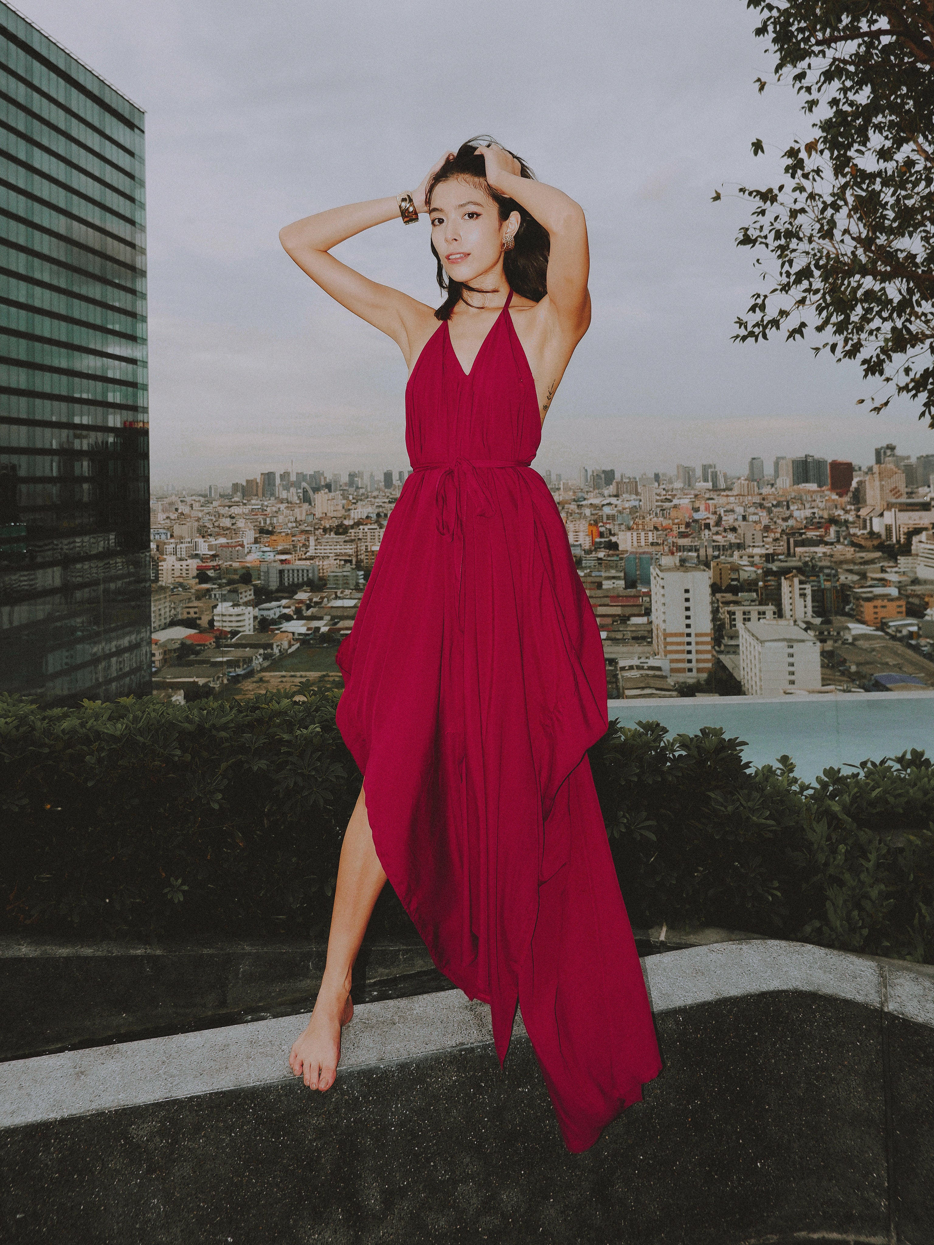 Shop The red burgundy Kaftan Maxi Dress - a unique convertible garment perfect for any event. This sustainable dress radiates a captivating bohemian allure, combining eco-friendliness with fashion.