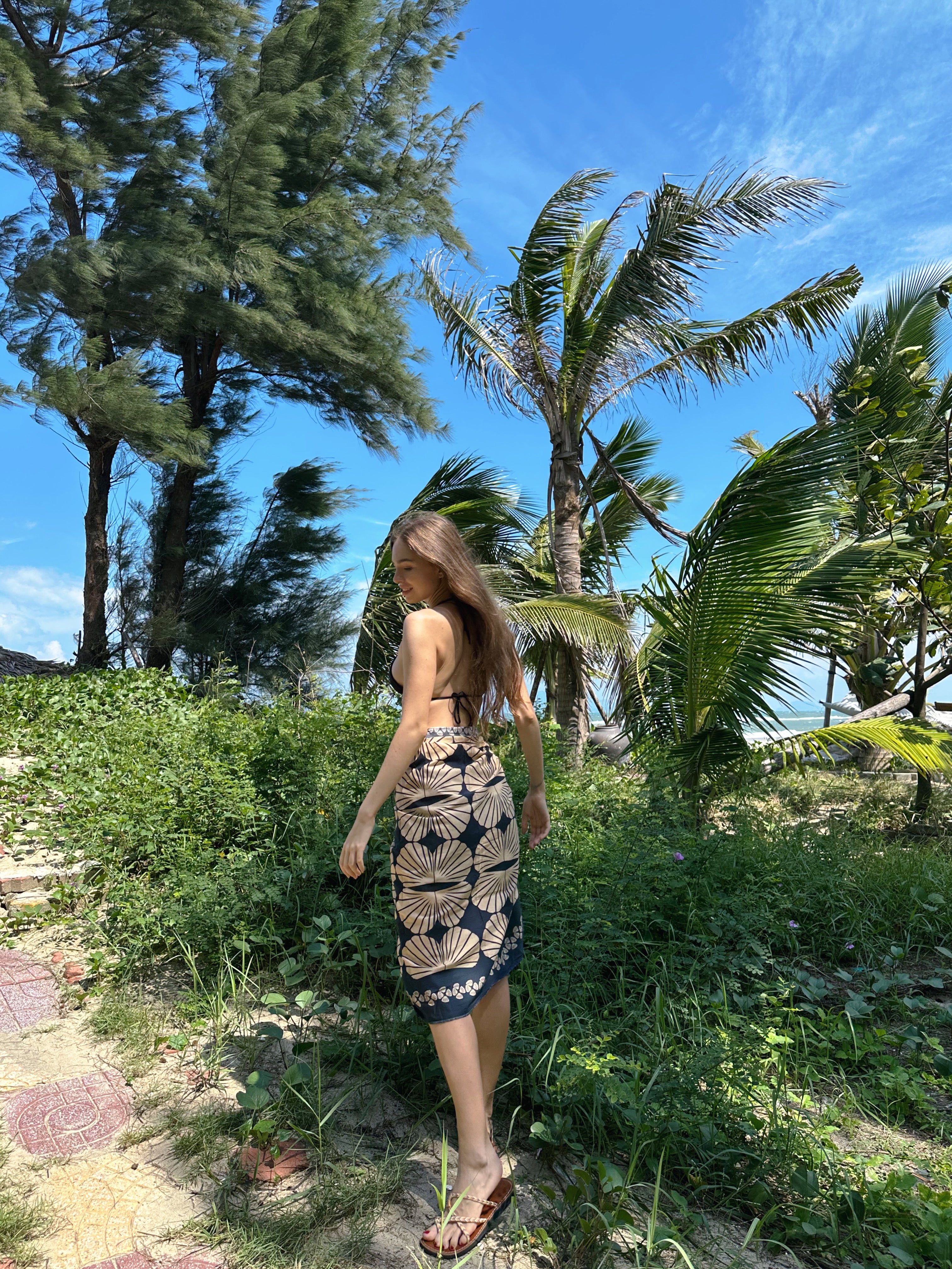 Organic Cotton Seashell Print Sarong – Beach Cover-Up | Coco De Chom
Handcrafted organic cotton sarong with seashell print, perfect as a beach cover-up. Lightweight, breathable, and eco-friendly for tropical vacations or resort wear.