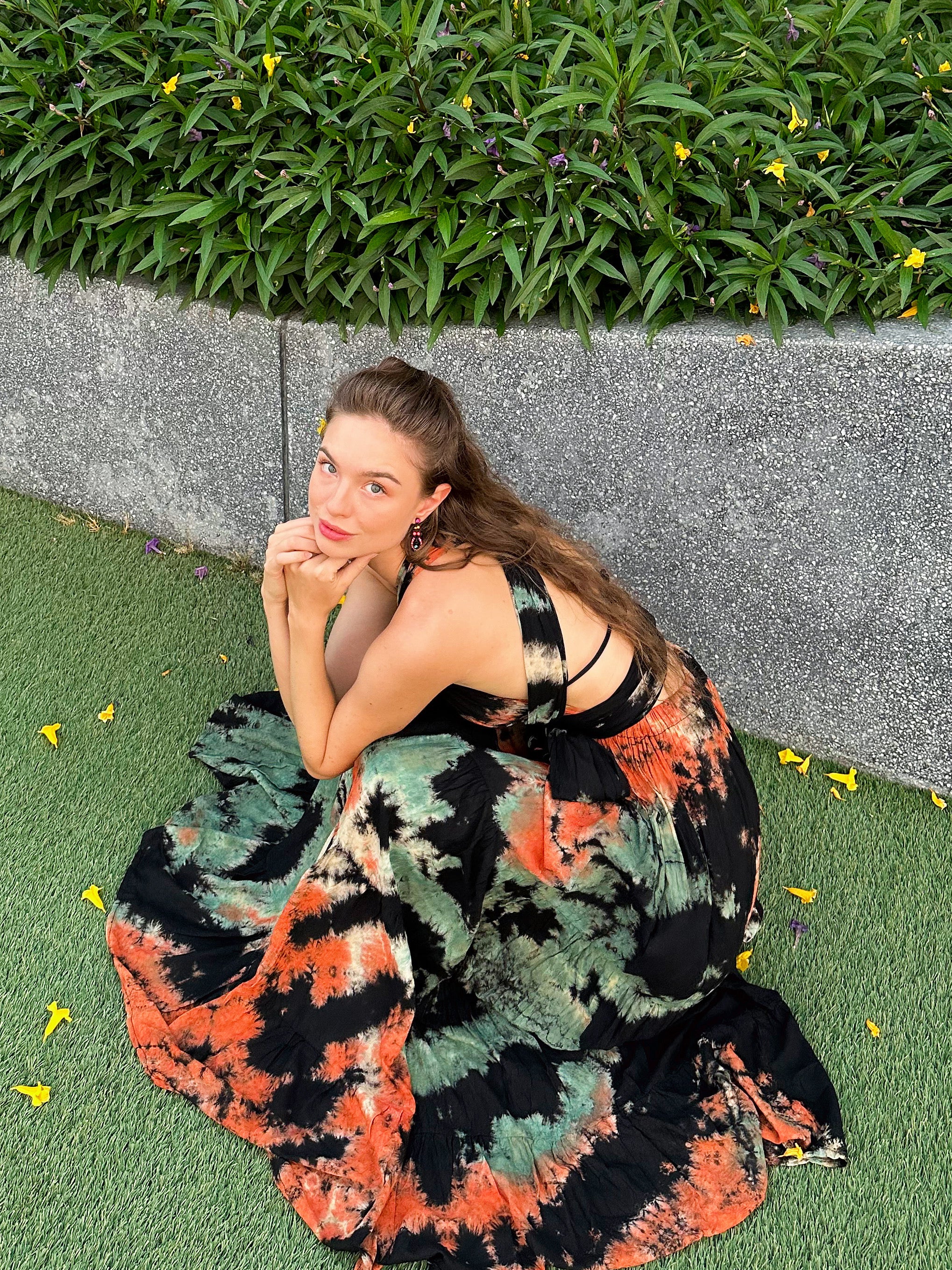 The Butterfly Infinity Maxi Dress Tie Dye is a limited edition piece featuring a maxi-length skirt and captivating hand-tie-dye pattern inspired by butterflies and vacation vibes. The dress is shown in a stylish and versatile design, suitable for transitioning seamlessly from day to night. With the Infinity Dress, you can explore different looks for any occasion. This lightweight and comfortable dress flatters all body types, making it perfect for bohemian style or resort wear.