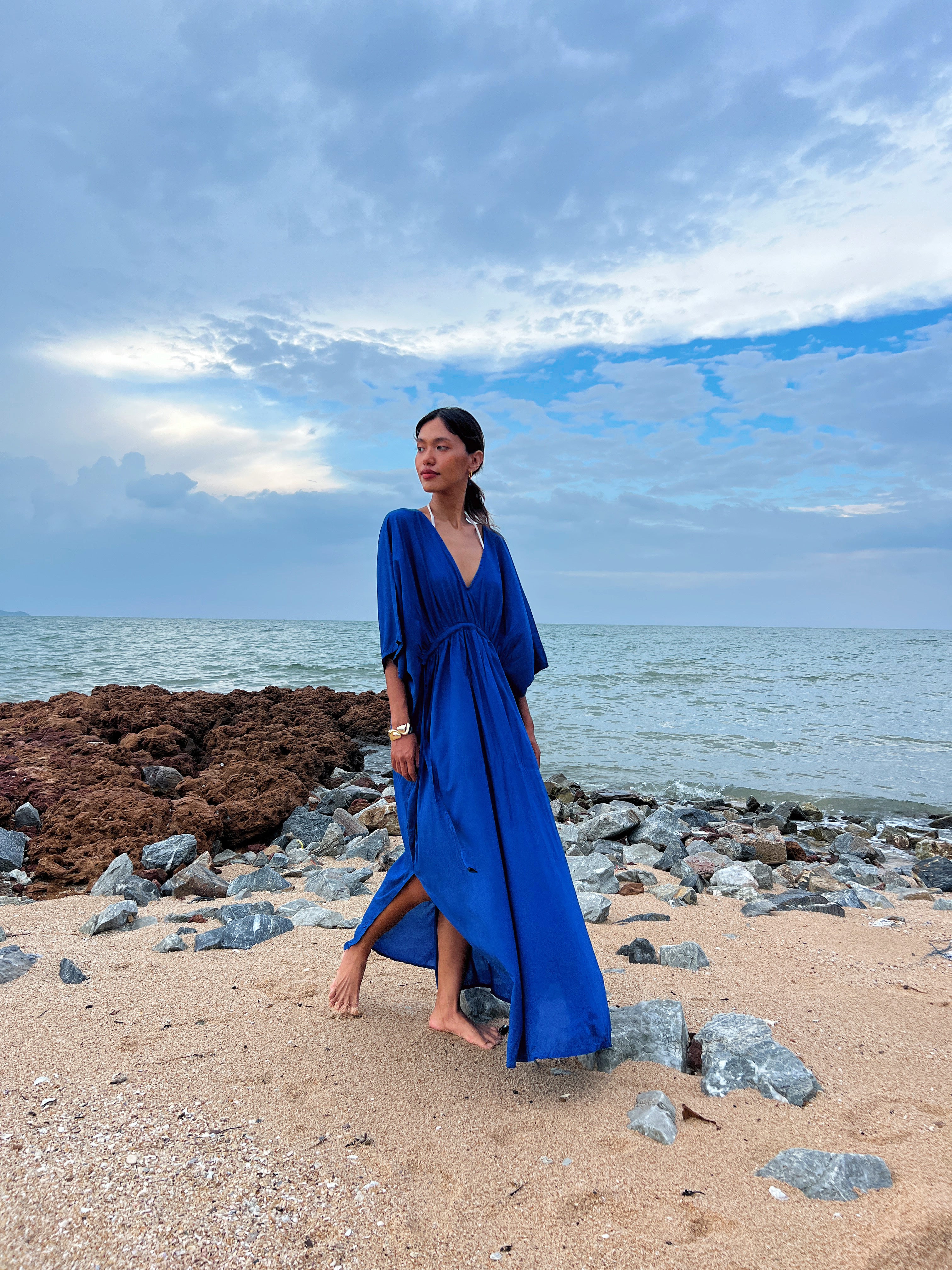 Discover the beauty of our Andaman Kaftan in Royal Blue, a versatile piece designed for your next escape. With inspiration from the vibrant ocean and sky, this oversized kaftan dress brings together elements of comfort, elegance, and timeless style. Whether worn as a maxi dress, beach cover-up, or wrap kimono, it effortlessly adds vacation vibes to any outfit.