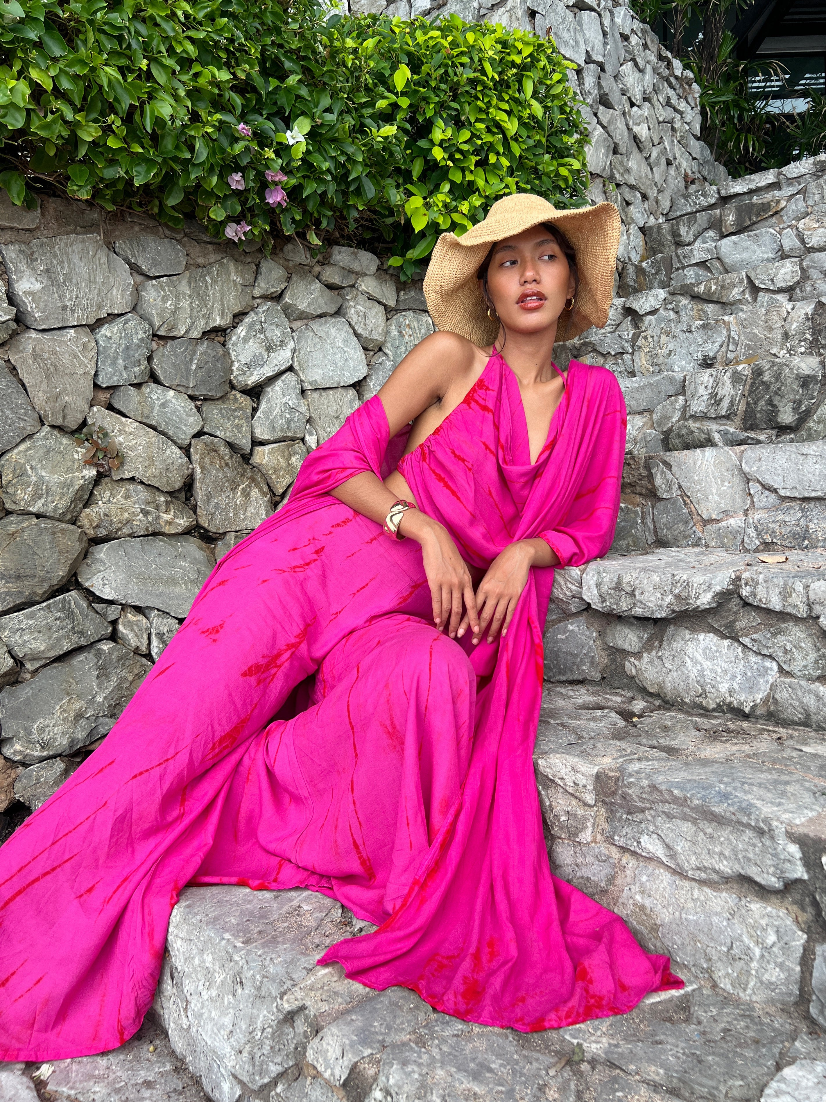 Shop Tie dye Crop top in Hot Pink Tie Dye, where playful style, bohemian vibes, and comfort come together effortlessly. This lovely piece is made from soft, lightweight fabric that's perfect for any occasion, whether it's yoga day, a music festival, or a beach vacation.