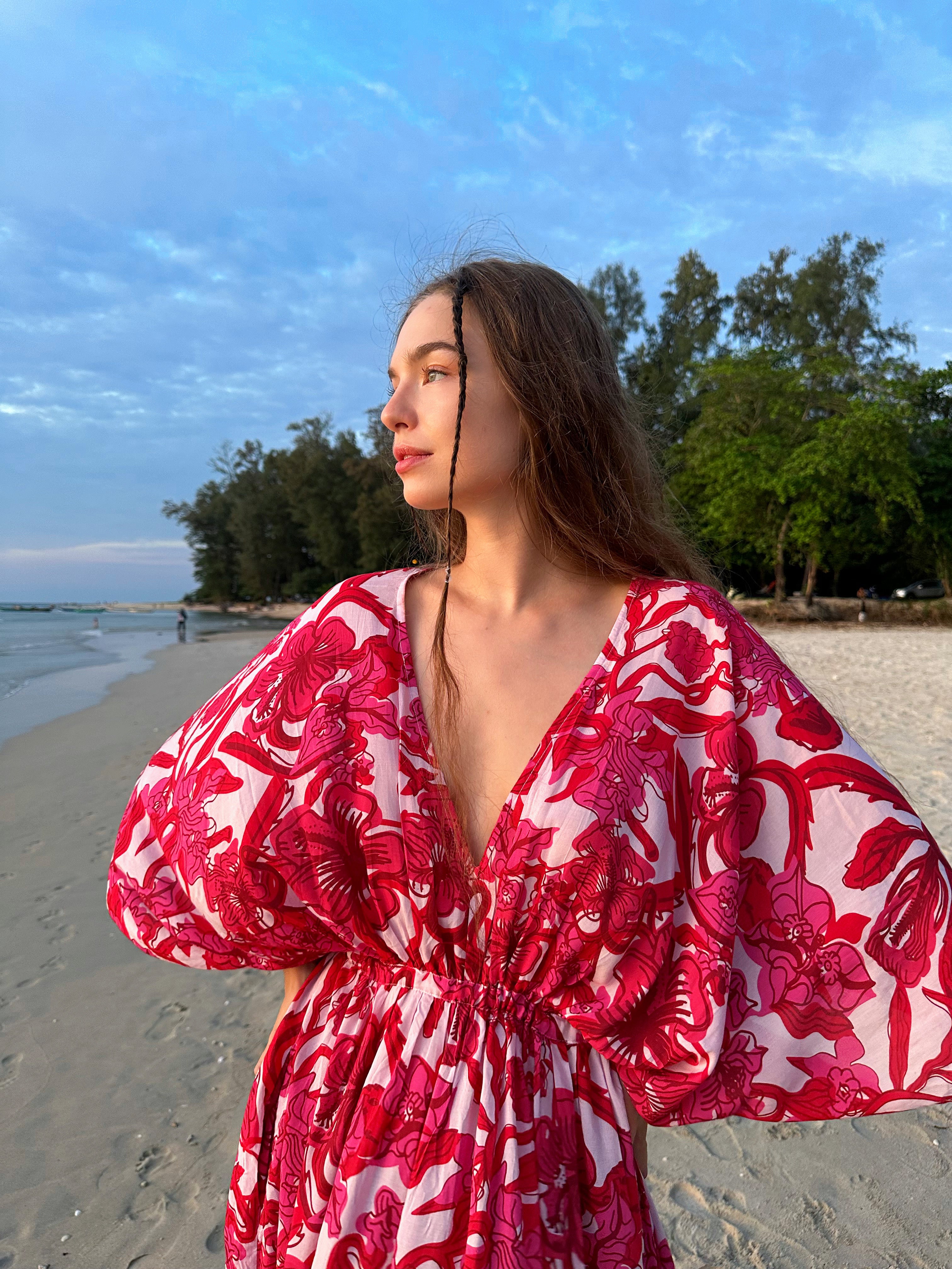 Discover the Kaftan in Pink Floral print—a striking fusion of vibrant color and meticulous design. Embrace the thrill of your upcoming escape with this chic and comfortable caftan, perfect for resort dress, cruise wear, party attire, and everyday elegance. Brought to you by Coco de Chom, this caftan is a stylish companion for various occasions.