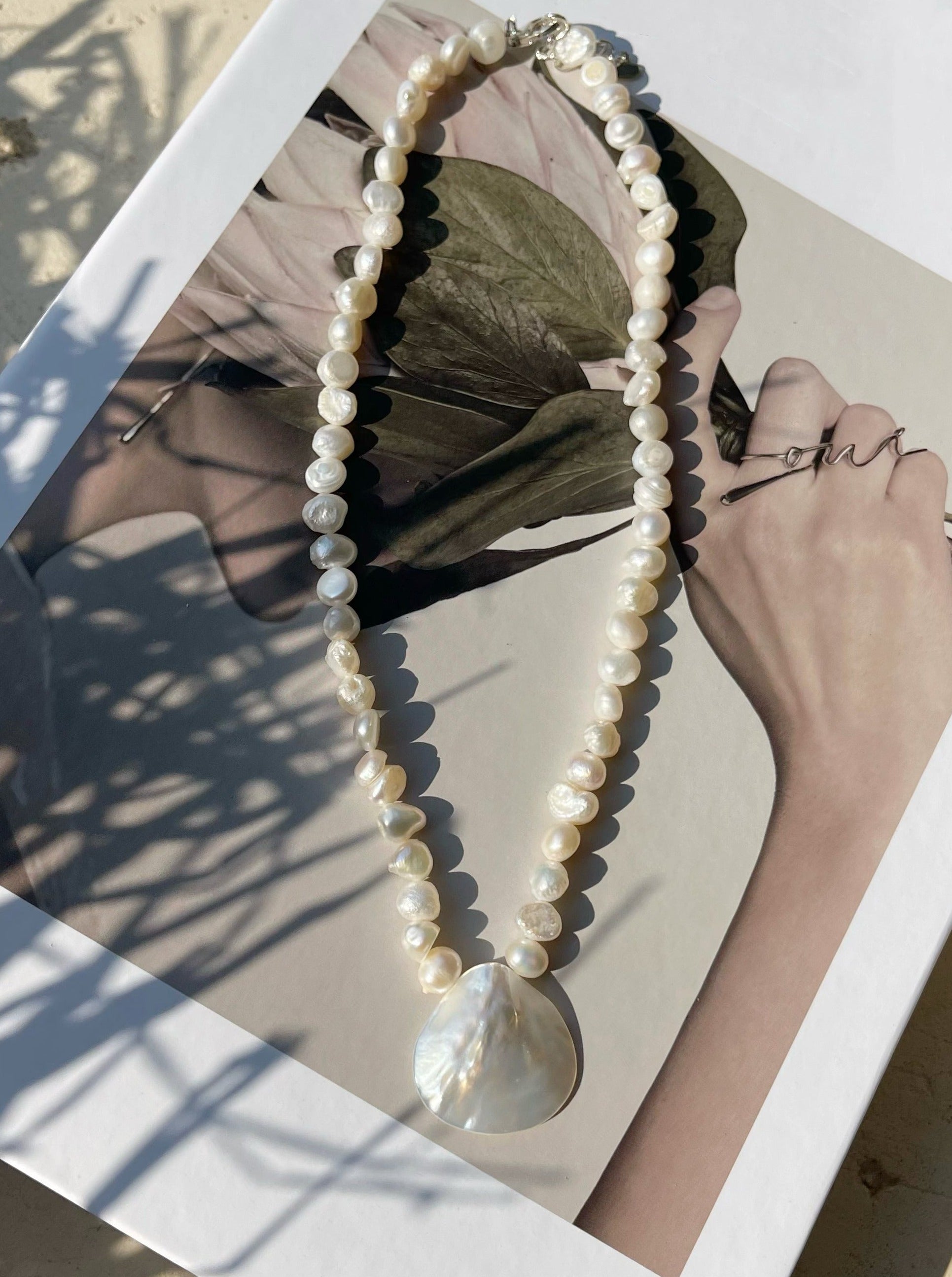 Mermaid Pearl Choker Necklace - Ideal for bohemian fashion lovers, suitable for beach vacations, beach weddings, or daily fashion. Offers minimalistic, boho, and beach-inspired style.