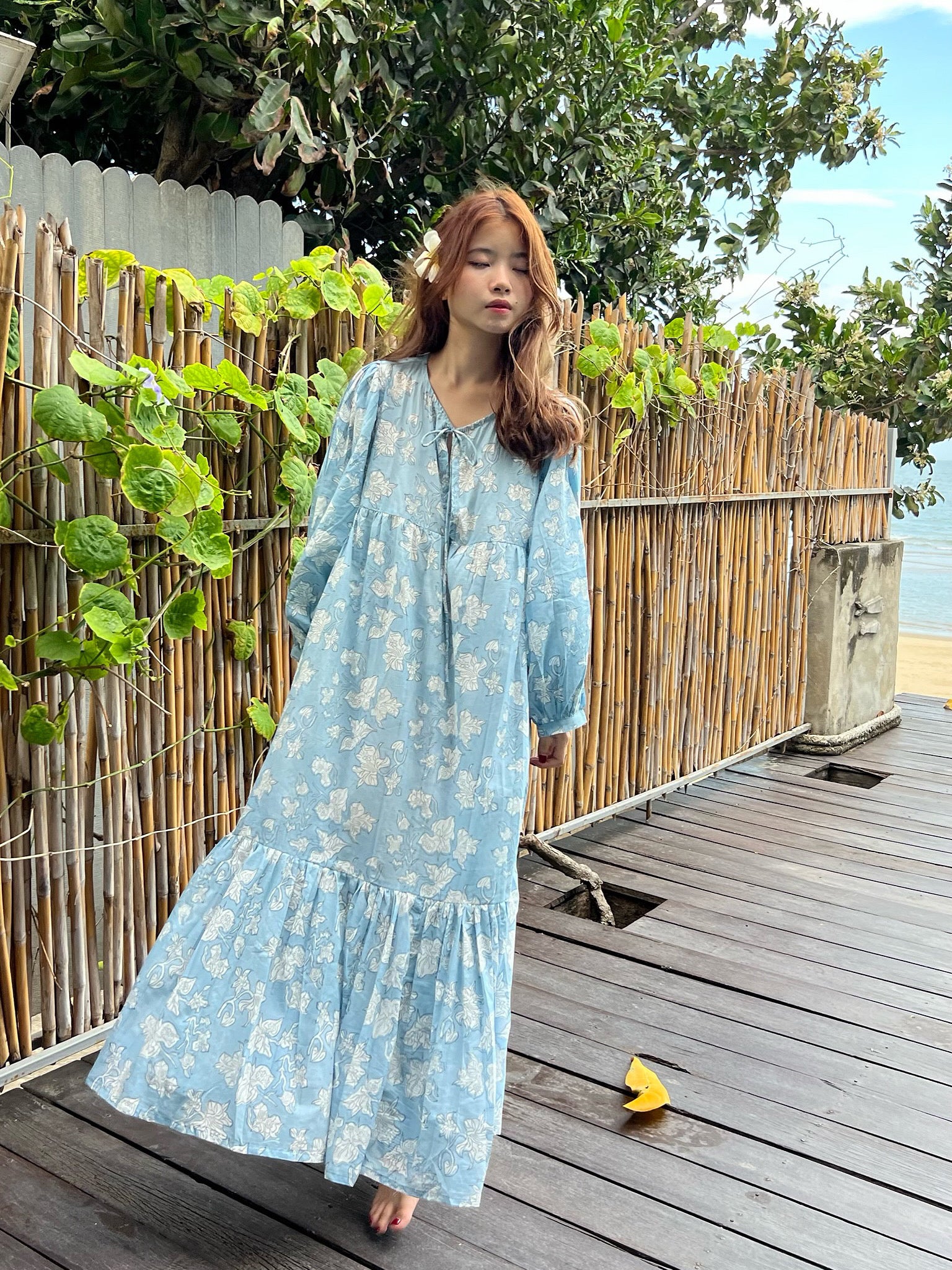 Shop Coco de Chom - new Introducing our Lola Bohemian Maxi Dress in Blue Limited Edition - an exceptionally unique piece available in limited quantities. The Lola's captivating design is handcrafted using wooden blocks meticulously placed on the finest cotton voile, resulting in a dreamy block printed pattern that draws inspiration from the bougainvillea flower and the vacation vibe. Wear it as a maxi dress for beach Boho vibes, style it as a bohemian outfit for festivals, or use it as a chic beach dress.