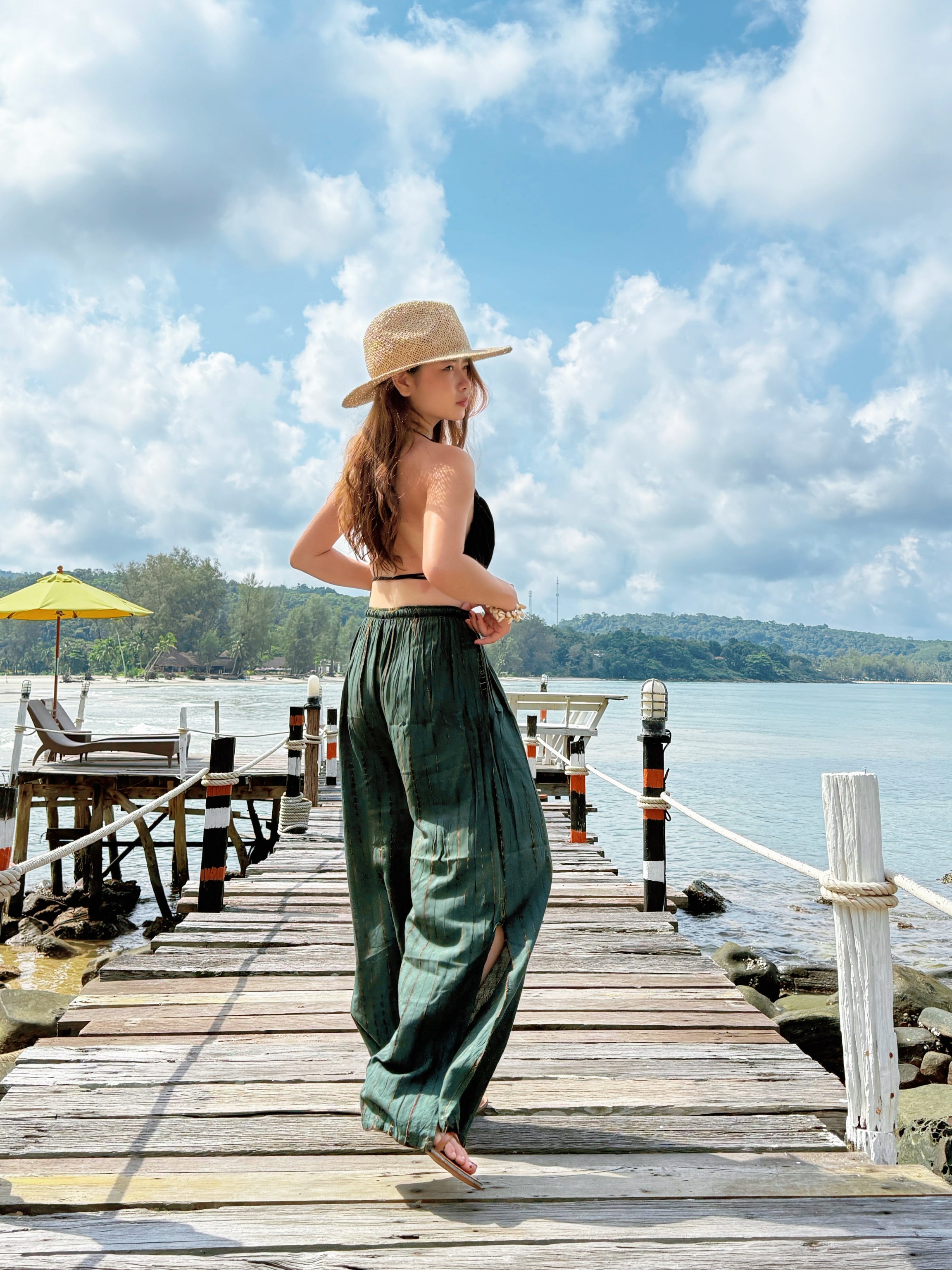 Handmade tie dye boho pants with wide leg silhouette, shown in natural light – lightweight cotton for beachwear, lounging, or travel