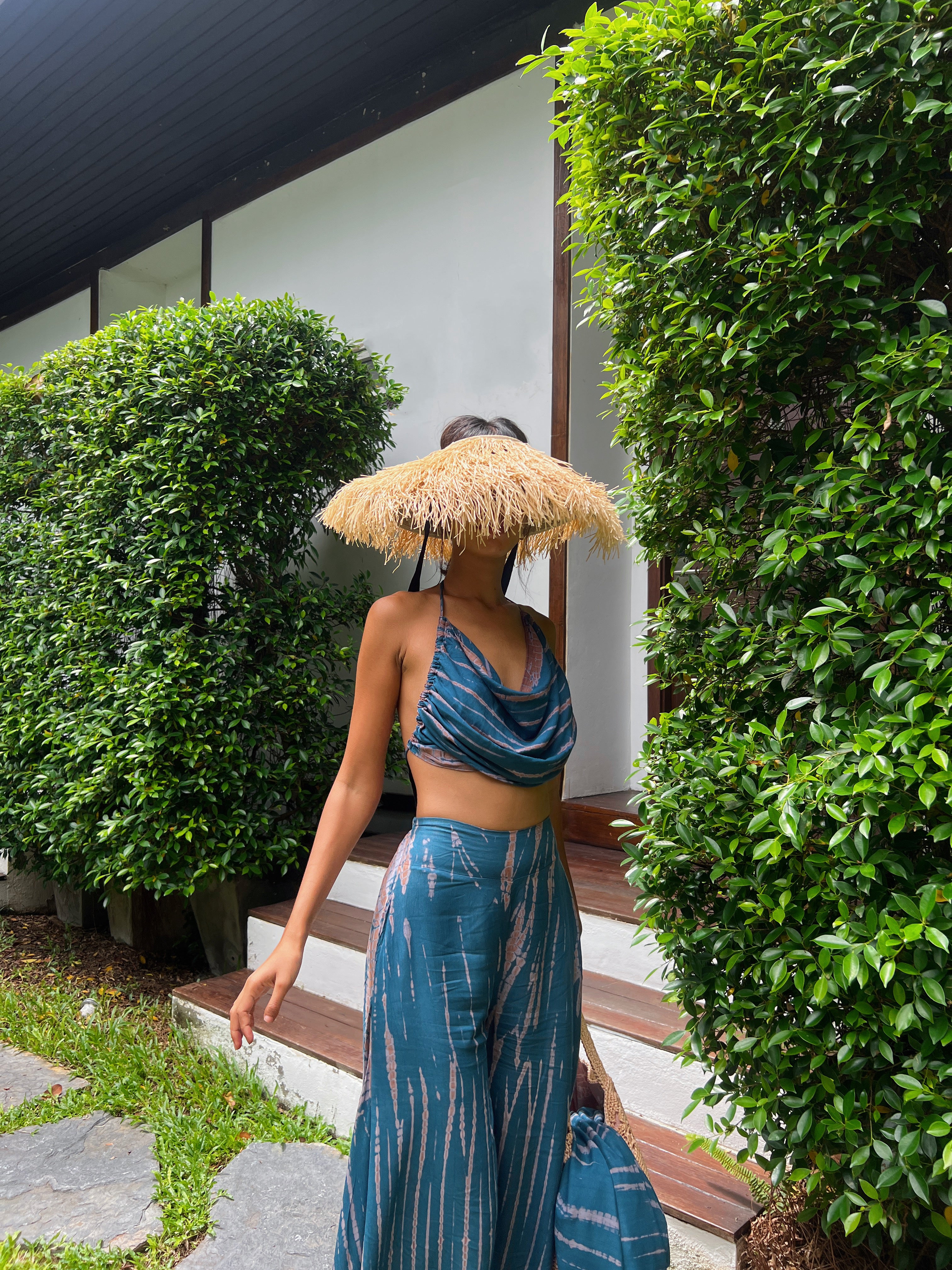 Shop our handcrafted Maya Crop Tops, where playful style, bohemian vibes, and comfort seamlessly combine. Crafted from soft, lightweight fabric, this stylish piece exudes chic bohemian aesthetics suitable for any occasion, be it your yoga class, a music festival, or a beach vacation from Coco de Chom