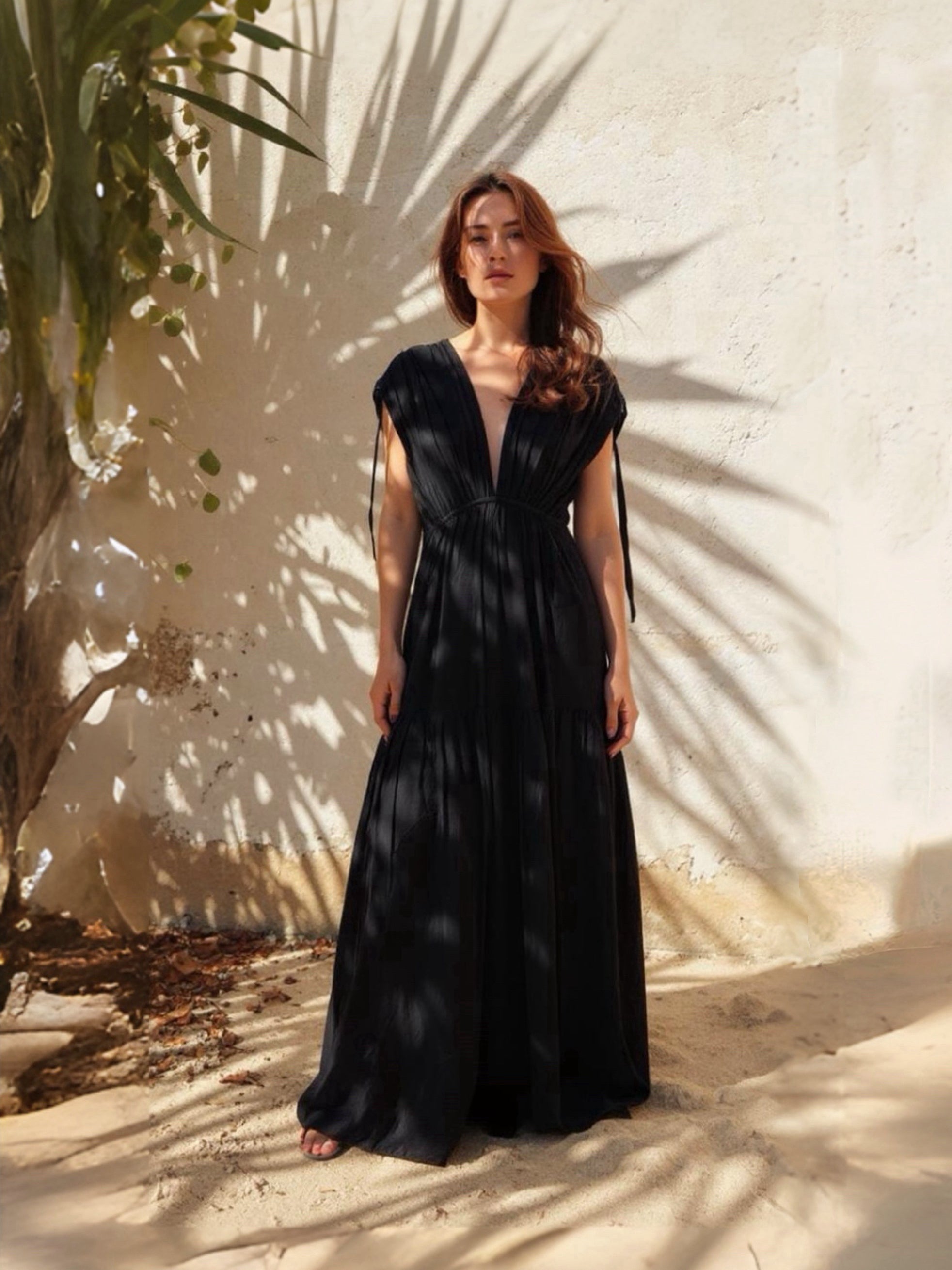 Model wearing our handmade Black Goddess Kaftan Dress with pockets. Giving a breezy, boho vibes—perfect for resort wear, beach days, vacations,
