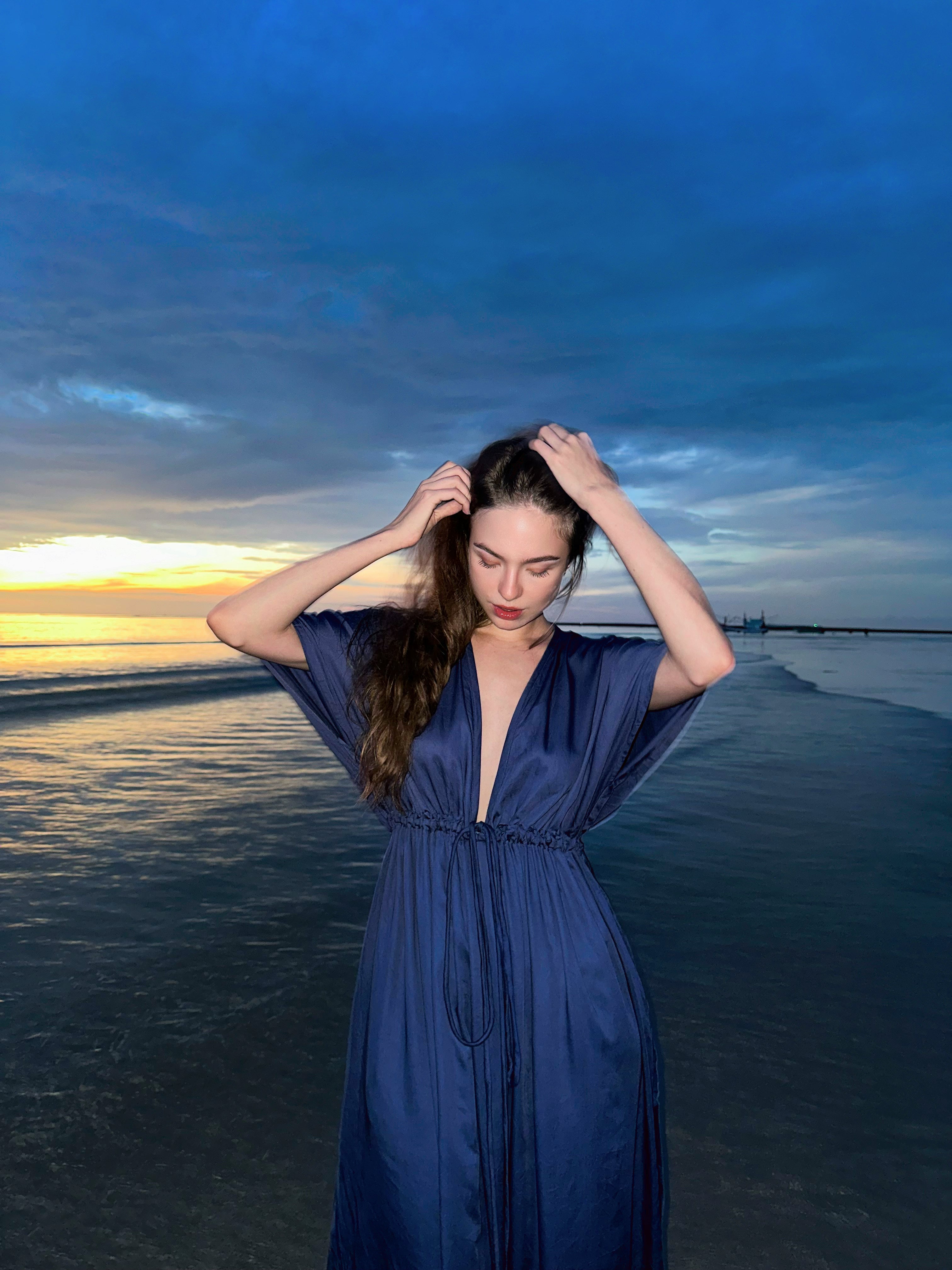 Shop comfort and elegance with our Goddess Kaftan Maxi Dress. This navy hand-dyed kaftan features a flowy, silky feel and a V-neck, making it the ideal choice for resort wear or vacation wear.