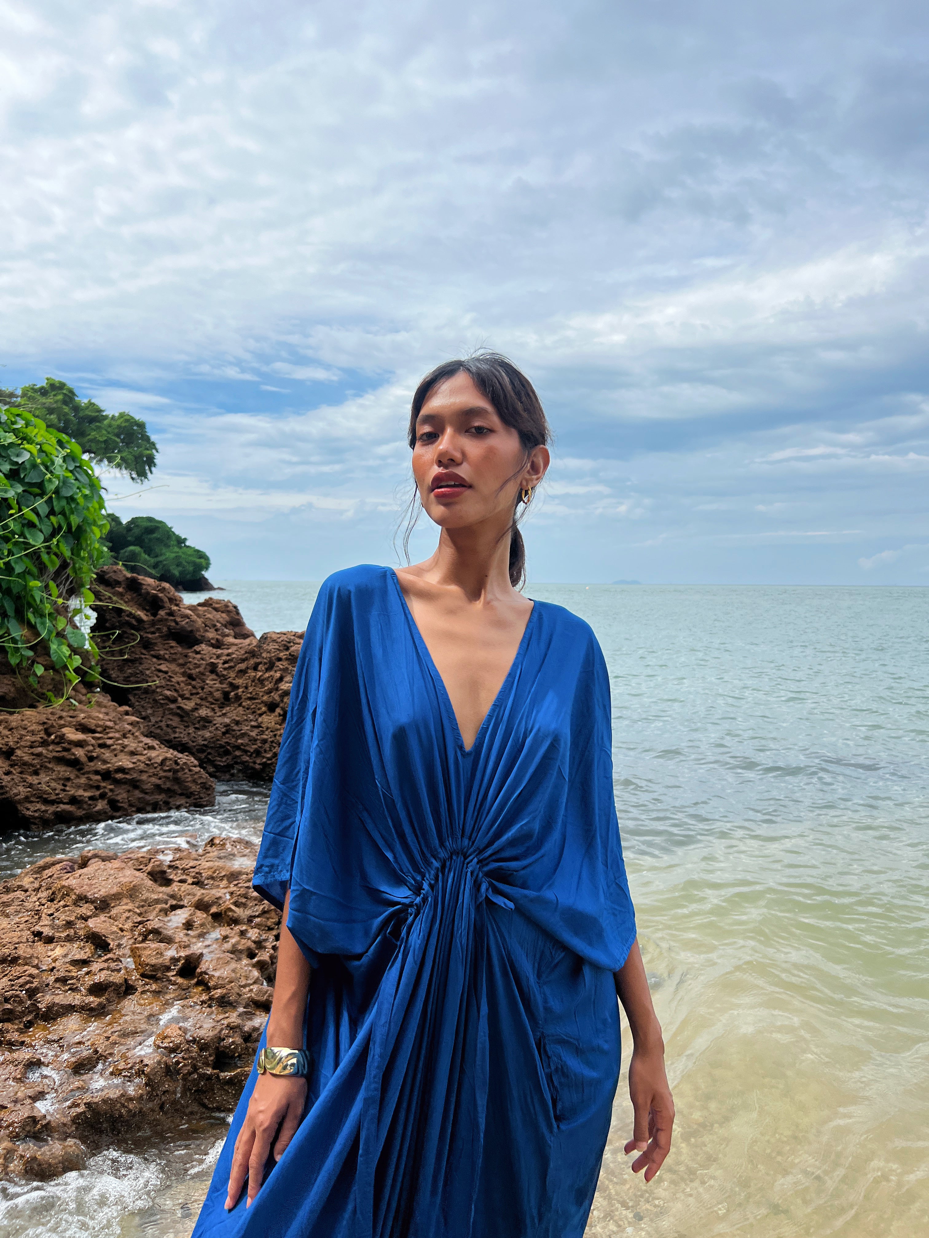 Discover the beauty of our Andaman Kaftan in Royal Blue, a versatile piece designed for your next escape. With inspiration from the vibrant ocean and sky, this oversized kaftan dress brings together elements of comfort, elegance, and timeless style. Whether worn as a maxi dress, beach cover-up, or wrap kimono, it effortlessly adds vacation vibes to any outfit.