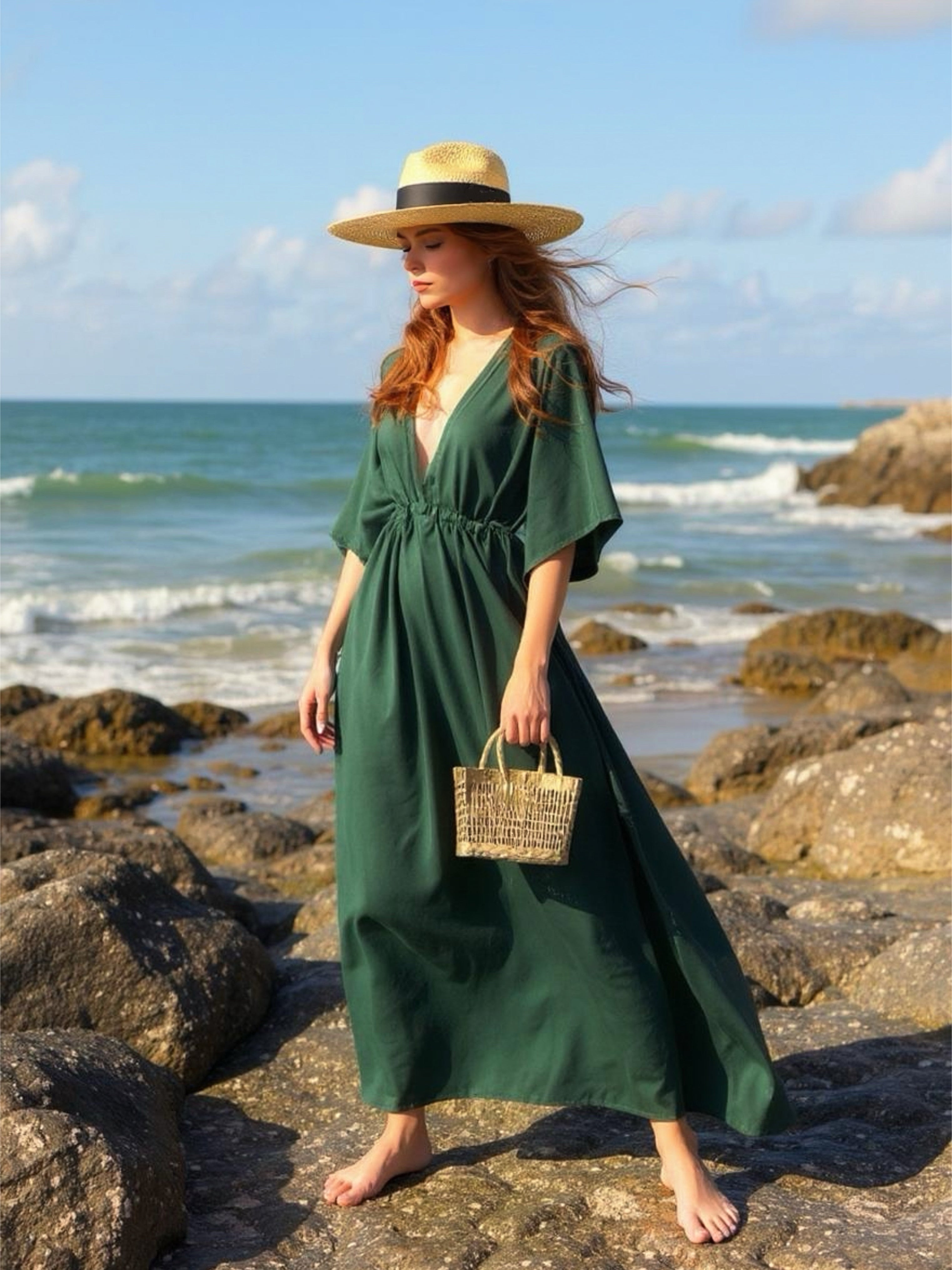 Woman wearing a flowy tie-dye kaftan maxi dress on the beach, featuring a deep V-neck, side slit, and cinched waist—handmade resortwear by Coco de Chom