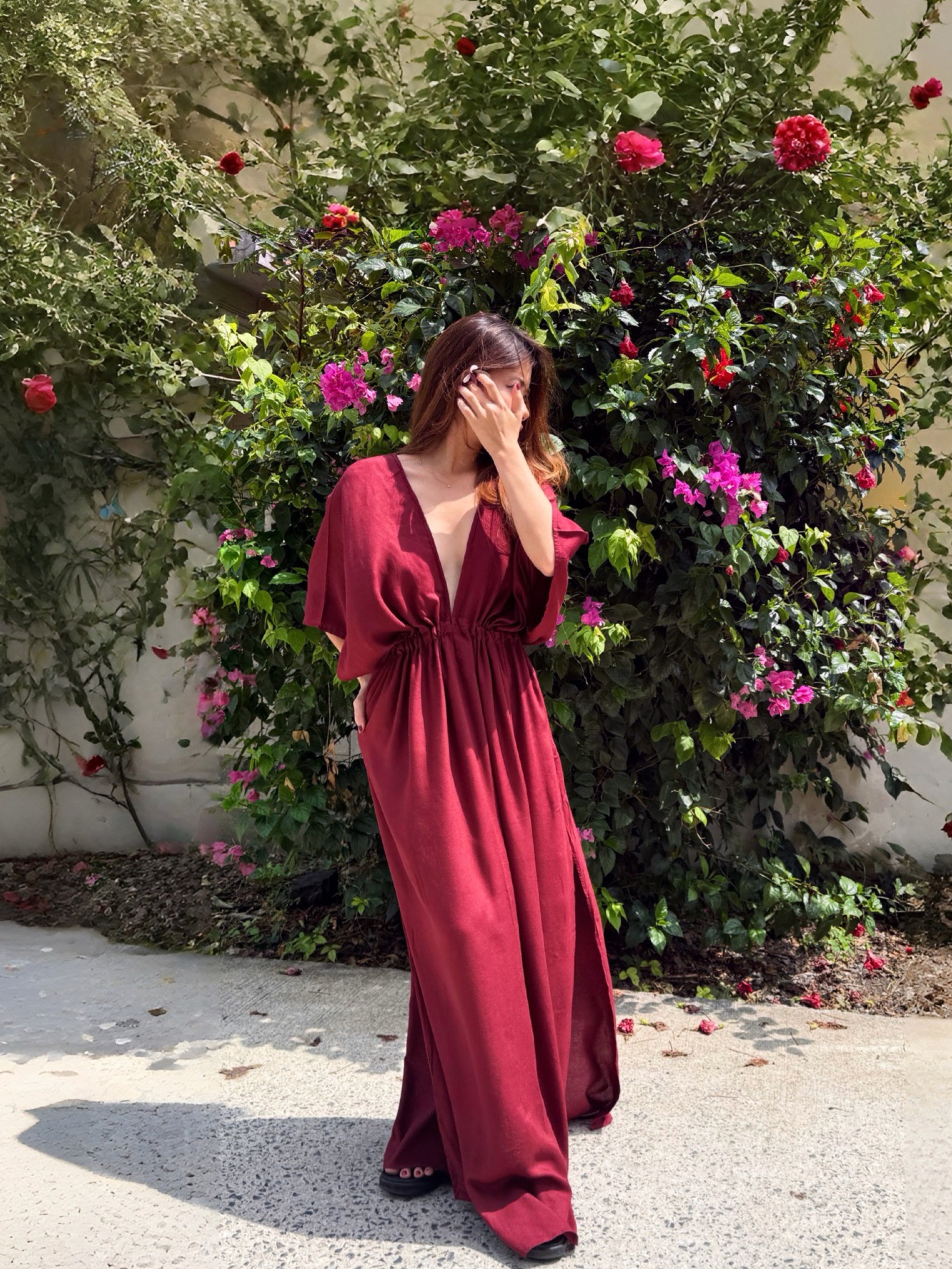 Burgundy Goddess Kaftan Dress worn as an oversized beach cover up, plus size friendly maternity caftan and boho resort maxi dress