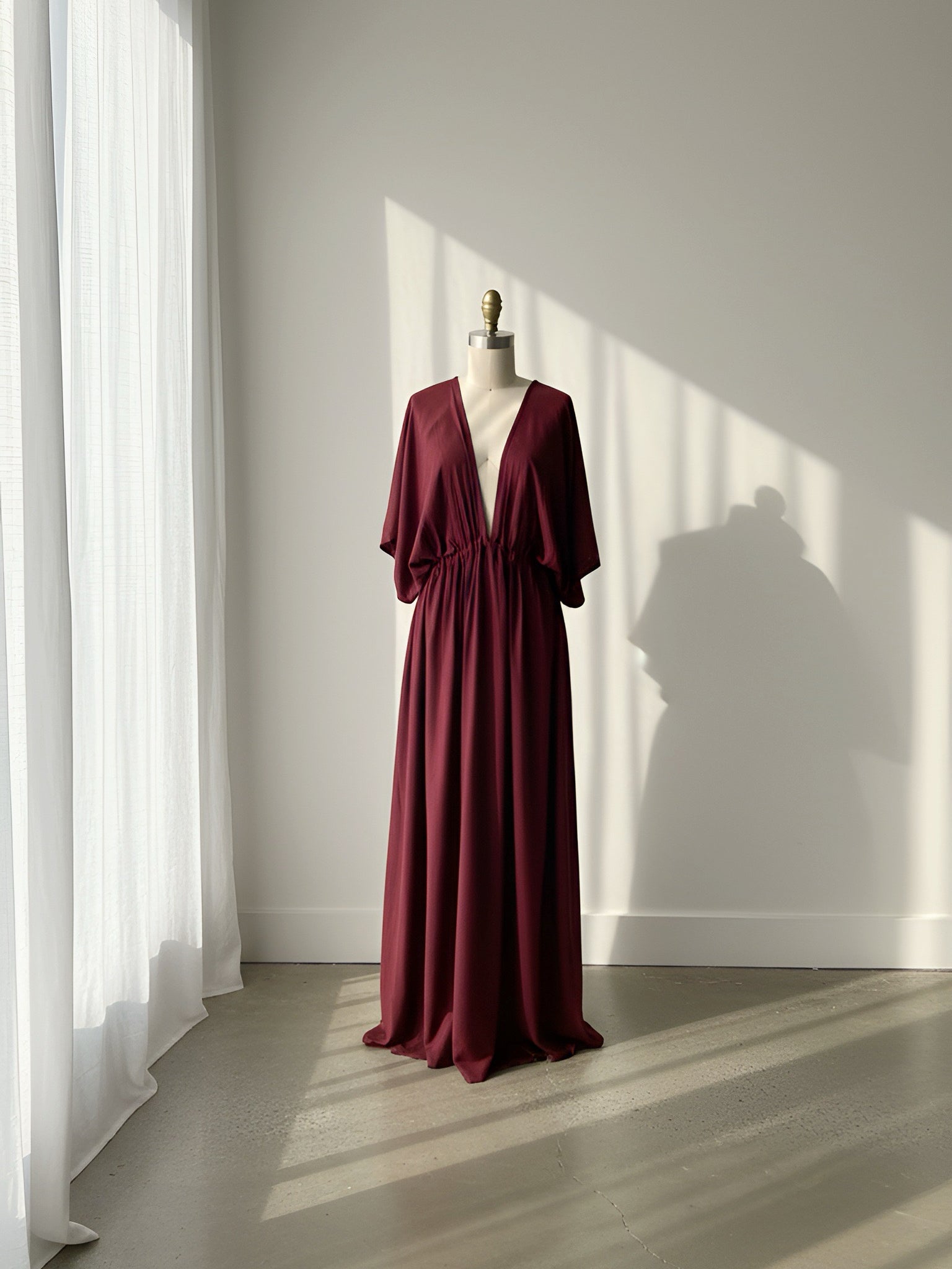 Burgundy Goddess Kaftan Dress worn as an oversized beach cover up, plus size friendly maternity caftan and boho resort maxi dress