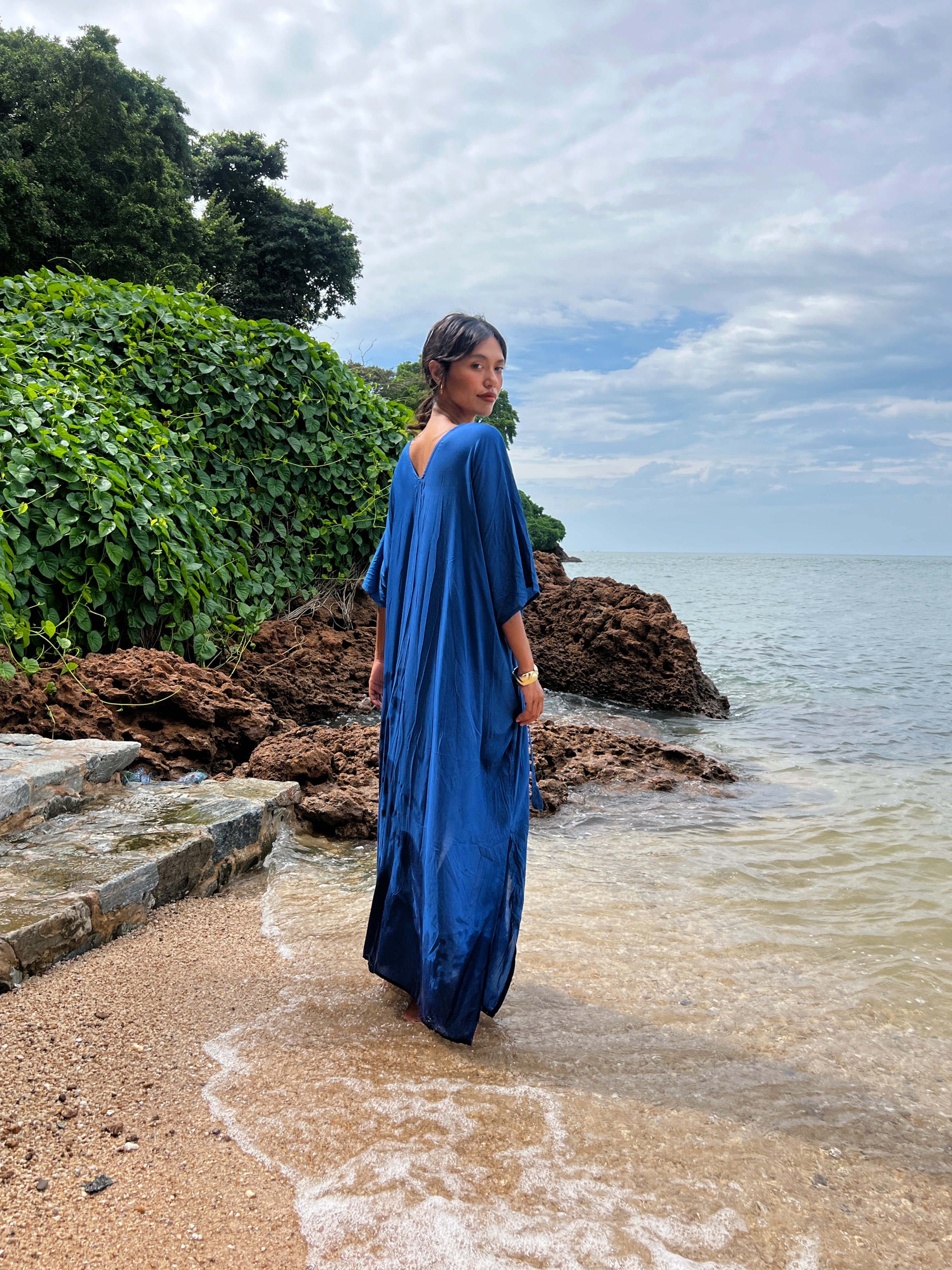 Discover the beauty of our Andaman Kaftan in Royal Blue, a versatile piece designed for your next escape. With inspiration from the vibrant ocean and sky, this oversized kaftan dress brings together elements of comfort, elegance, and timeless style. Whether worn as a maxi dress, beach cover-up, or wrap kimono, it effortlessly adds vacation vibes to any outfit.