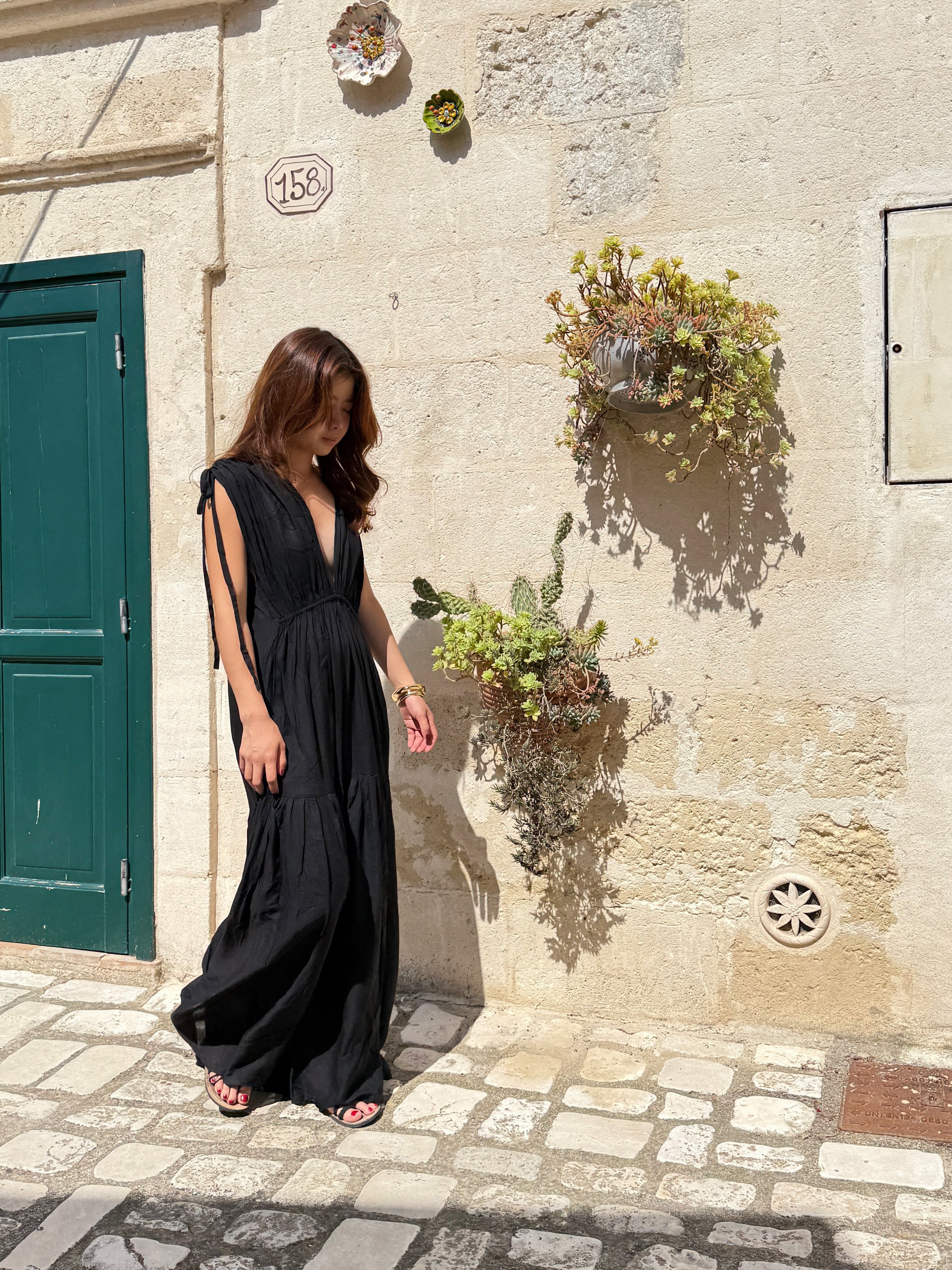 Model wearing our handmade Black Goddess Kaftan Dress with pockets. Giving a breezy, boho vibes—perfect for resort wear, beach days, vacations,