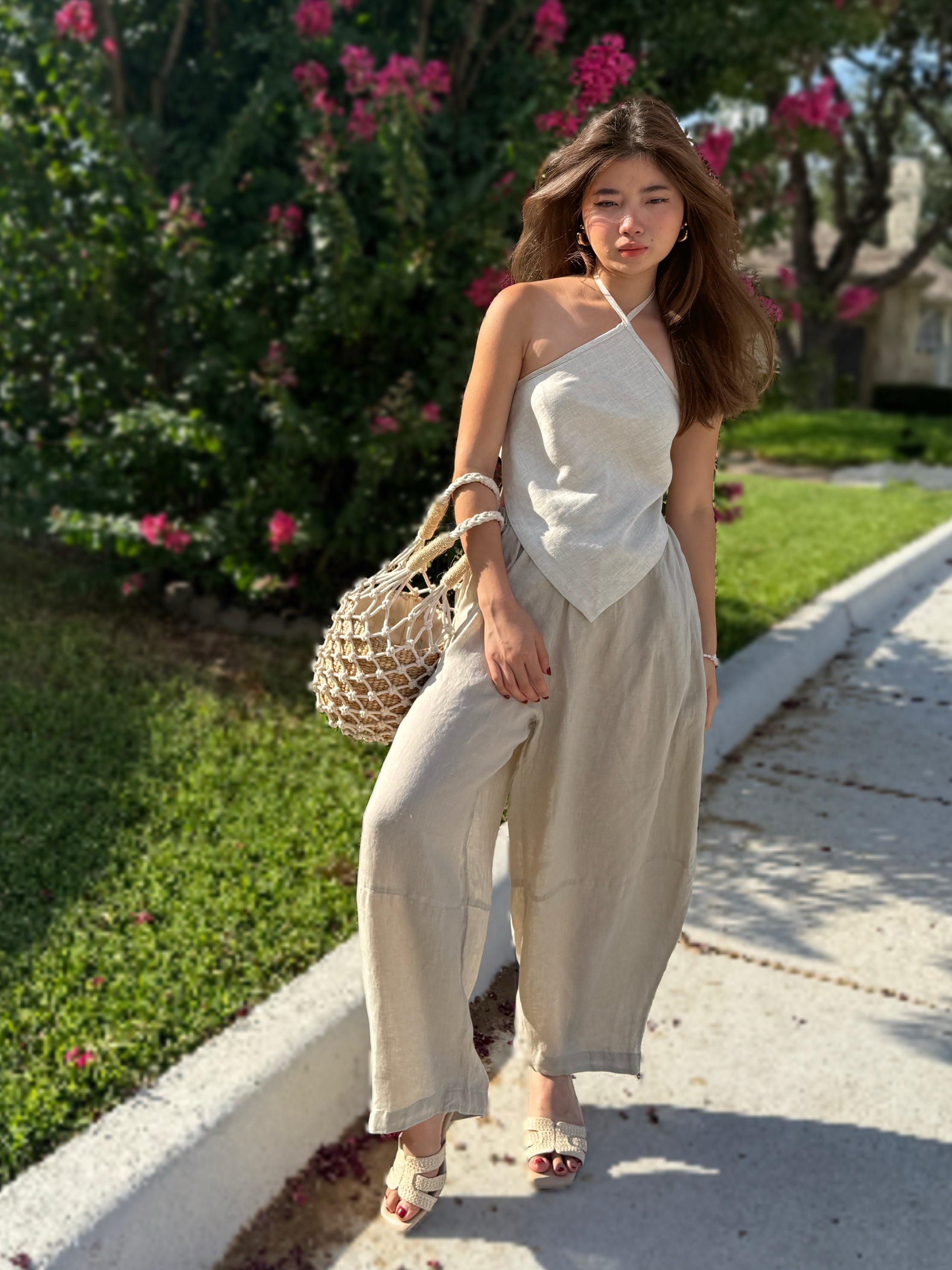 Side view of off white hemp halter crop top – handmade minimalist yoga and resort wear.