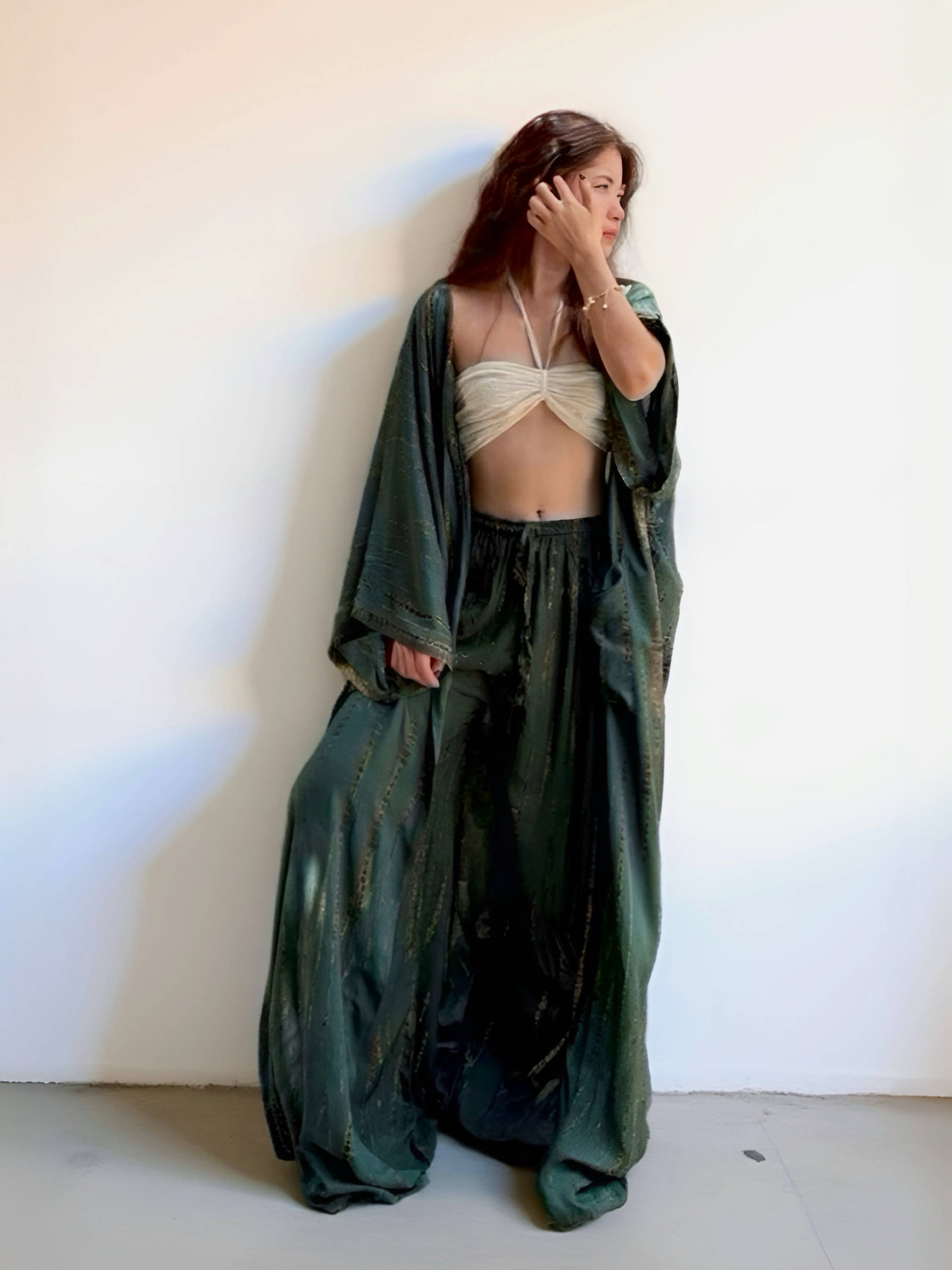 Model wearing the green tie dye kimono robe by Coco de Chom — a long, boho-style kimono handcrafted by artisans with a unique green long tie dye pattern, perfect for boho style.