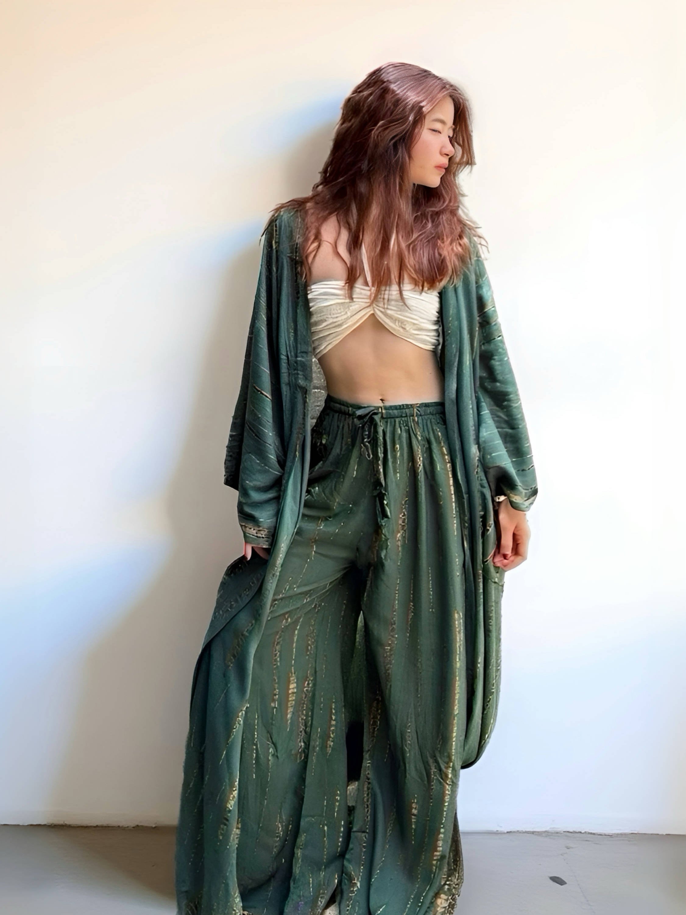 Model wearing the green tie dye kimono robe by Coco de Chom — a long, boho-style kimono handcrafted by artisans with a unique green long tie dye pattern, perfect for boho style.