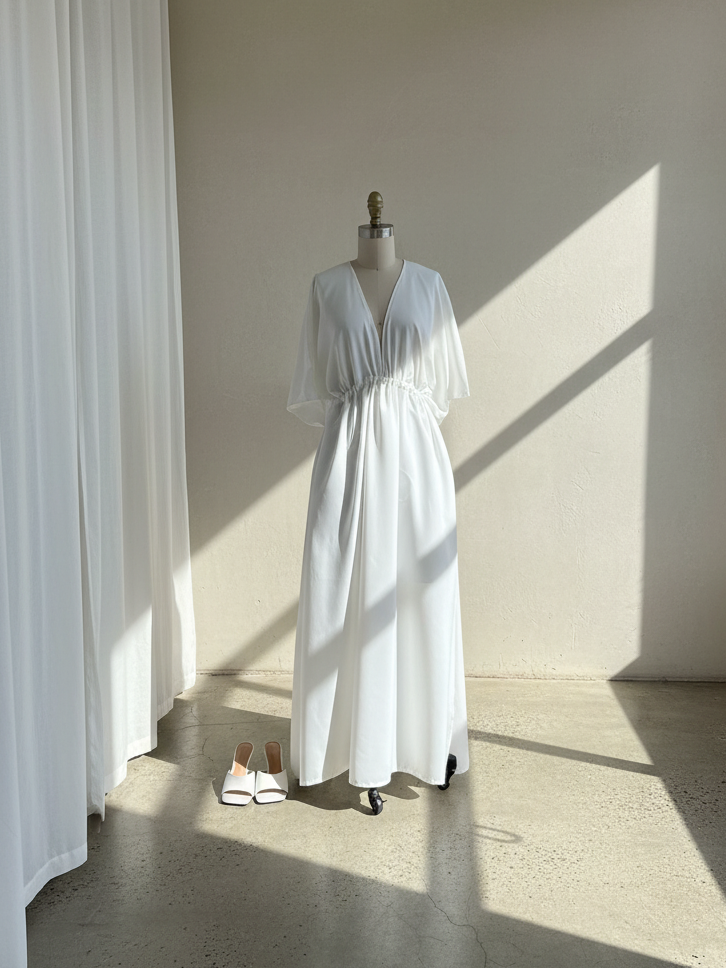 White Maxi Dress in limitless comfort and elegance with our Goddess Kaftan Maxi Dress. With a flowy skirt and a V neck, this modal maxi dress is the perfect vacation wear.