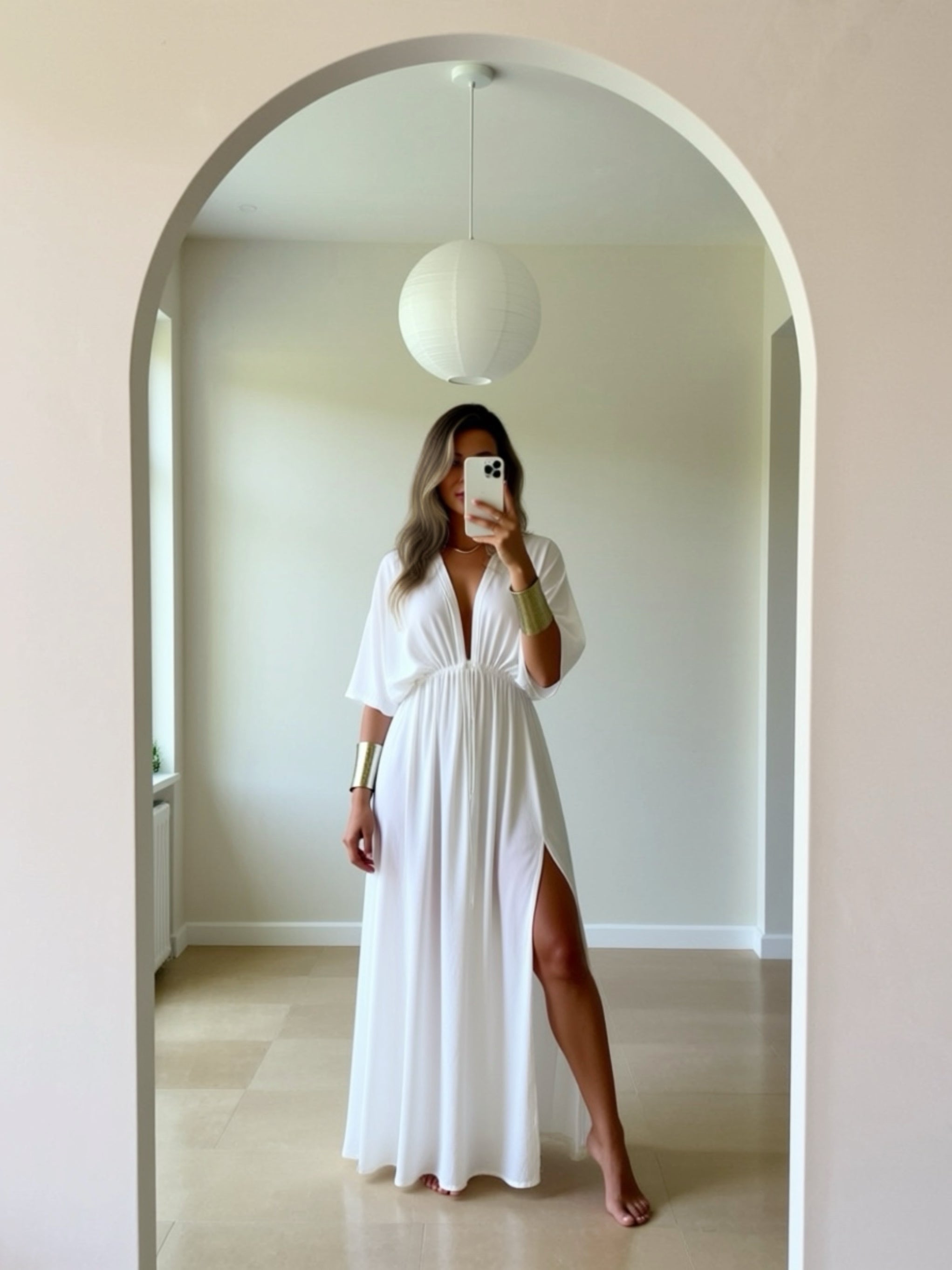 White Maxi Dress in limitless comfort and elegance with our Goddess Kaftan Maxi Dress. With a flowy skirt and a V neck, this modal maxi dress is the perfect vacation wear.