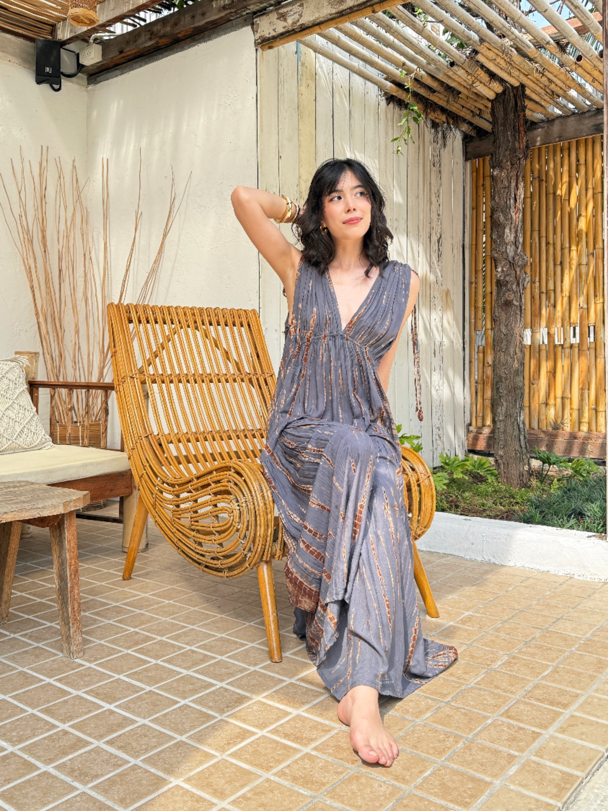 Model wearing the handmade Athena Goddess Kaftan Dress, a tie-dye maxi with pockets, flowy silhouette, and deep V-neckline—perfect for summer dress, beach coverup, resort wear or festivals.