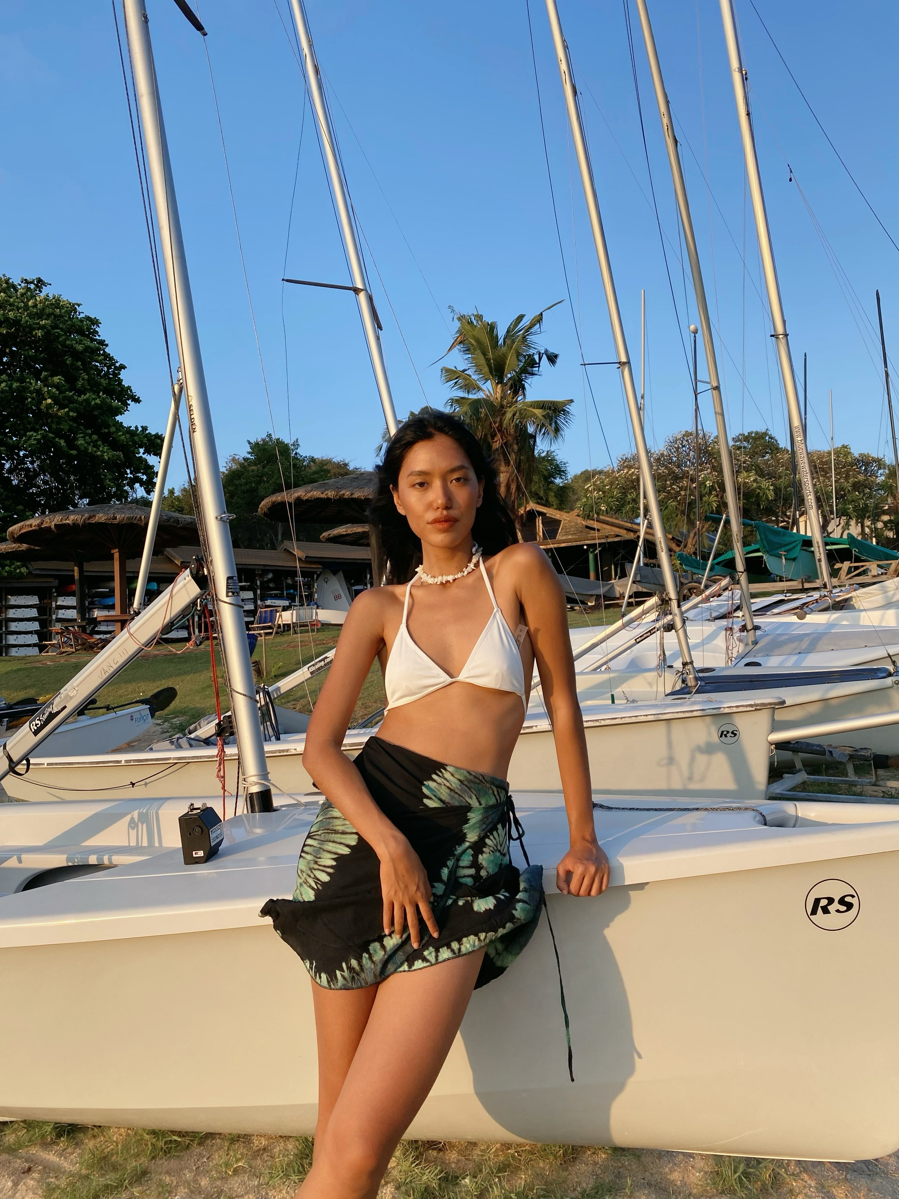 Elevate your beach boho style with our Tie-Dye Mini Wrap Skirt, a charming and flirty addition to any beach outfit. Crafted from lightweight fabric, it's an ideal choice for beach days and tropical getaways. The tie-dye skirt detailing brings a touch of vintage-inspired flair while staying right on-trend. This boho mini skirt is your perfect companion for wanderlust-filled adventures, effortlessly transitioning your swimsuit from the beach to a delightful dinner with friends.