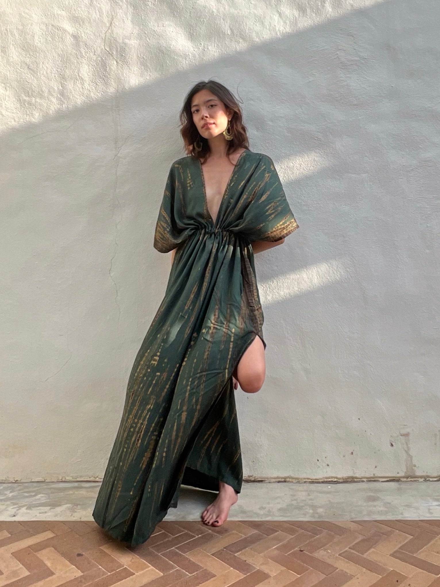 Green Goddess Tie-Dye Kaftan Maxi Dress: A captivating, airy long kaftan that ignites dreams of wind in your hair, the gentle sounds of ocean waves, and the sand beneath your feet. The perfect choice for a beach cover-up, beach dress, or resort dress on your vacation. Shop with Coco de Chom?