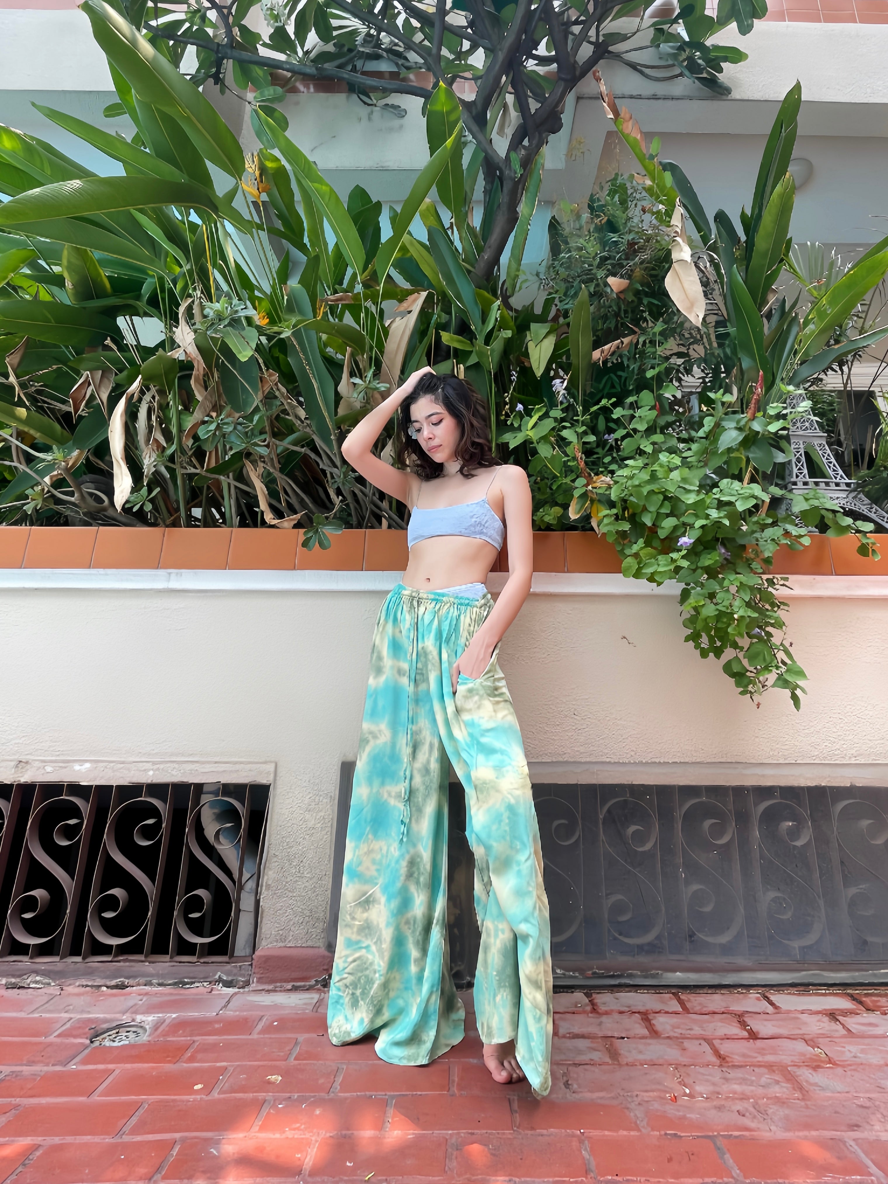 Stay cool and comfortable in our flowy beach summer tie dye wide leg pants. Choose from a variety of colors and styles to make your beach day perfect.