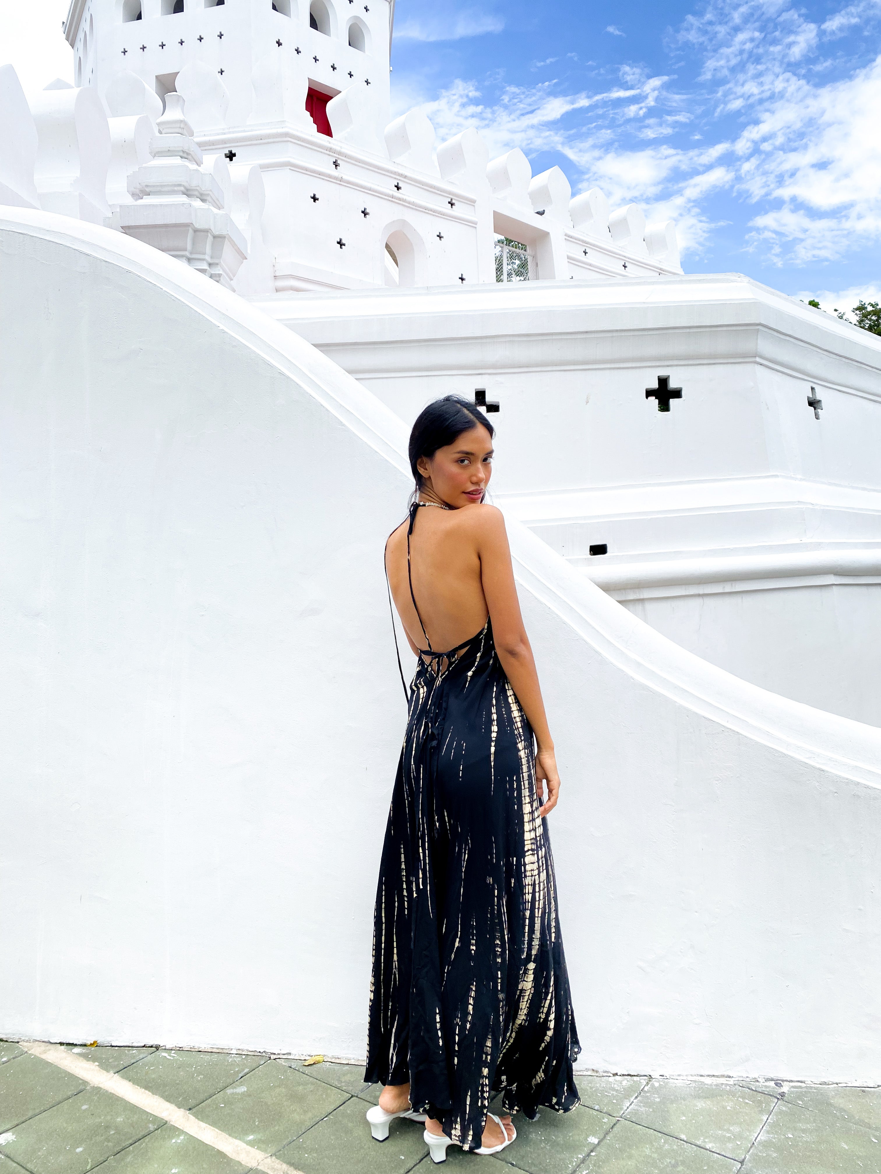 This is Luna tie dye maxi dress -Embrace dreamy vacation vibes any time of the year with this tie-dye halter neck maxi dress.