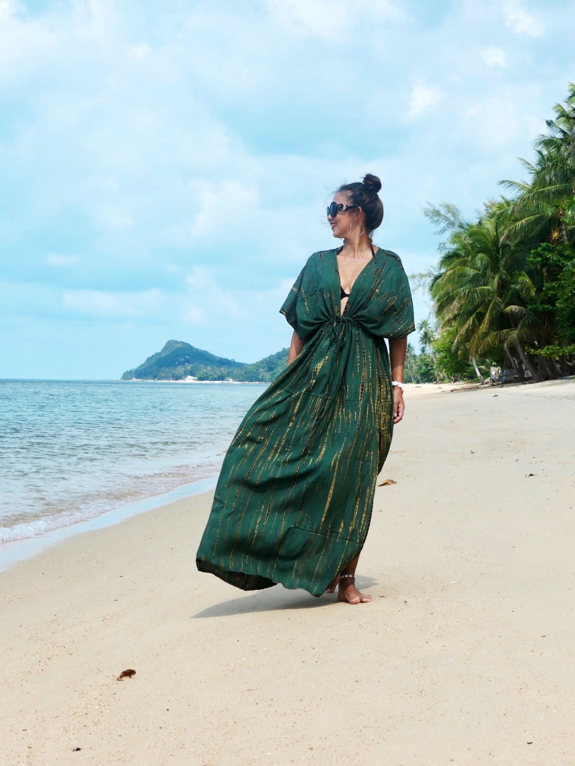 Green Goddess Tie-Dye Kaftan Maxi Dress: A captivating, airy long kaftan that ignites dreams of wind in your hair, the gentle sounds of ocean waves, and the sand beneath your feet. The perfect choice for a beach cover-up, beach dress, or resort dress on your vacation. Shop with Coco de Chom?