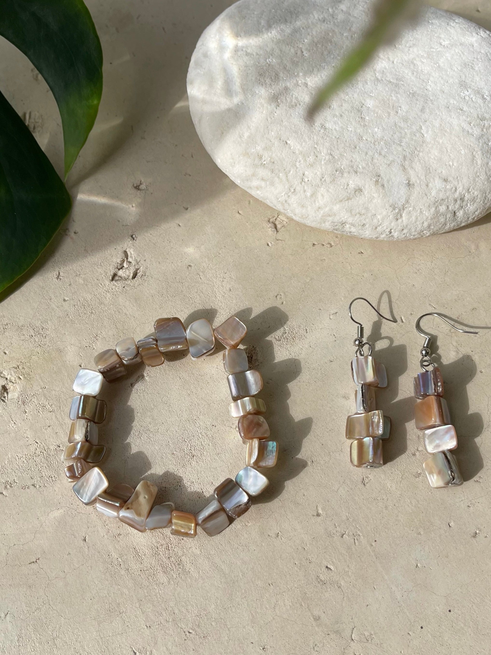 Natural Mother of pearl bracelet on a sandy surface, perfect for beach dress boho style - handmade jewelry