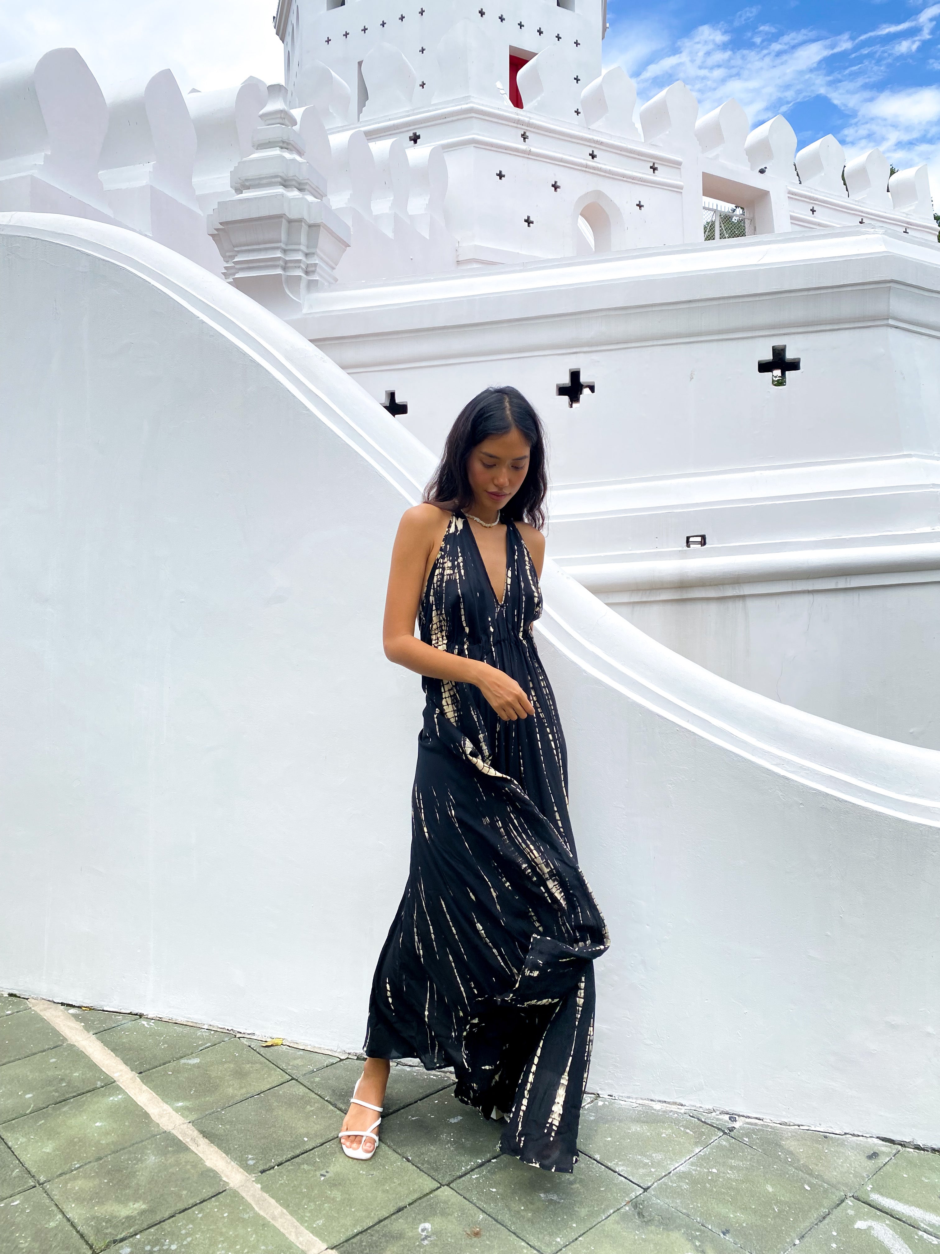 This is Luna tie dye maxi dress -Embrace dreamy vacation vibes any time of the year with this tie-dye halter neck maxi dress.