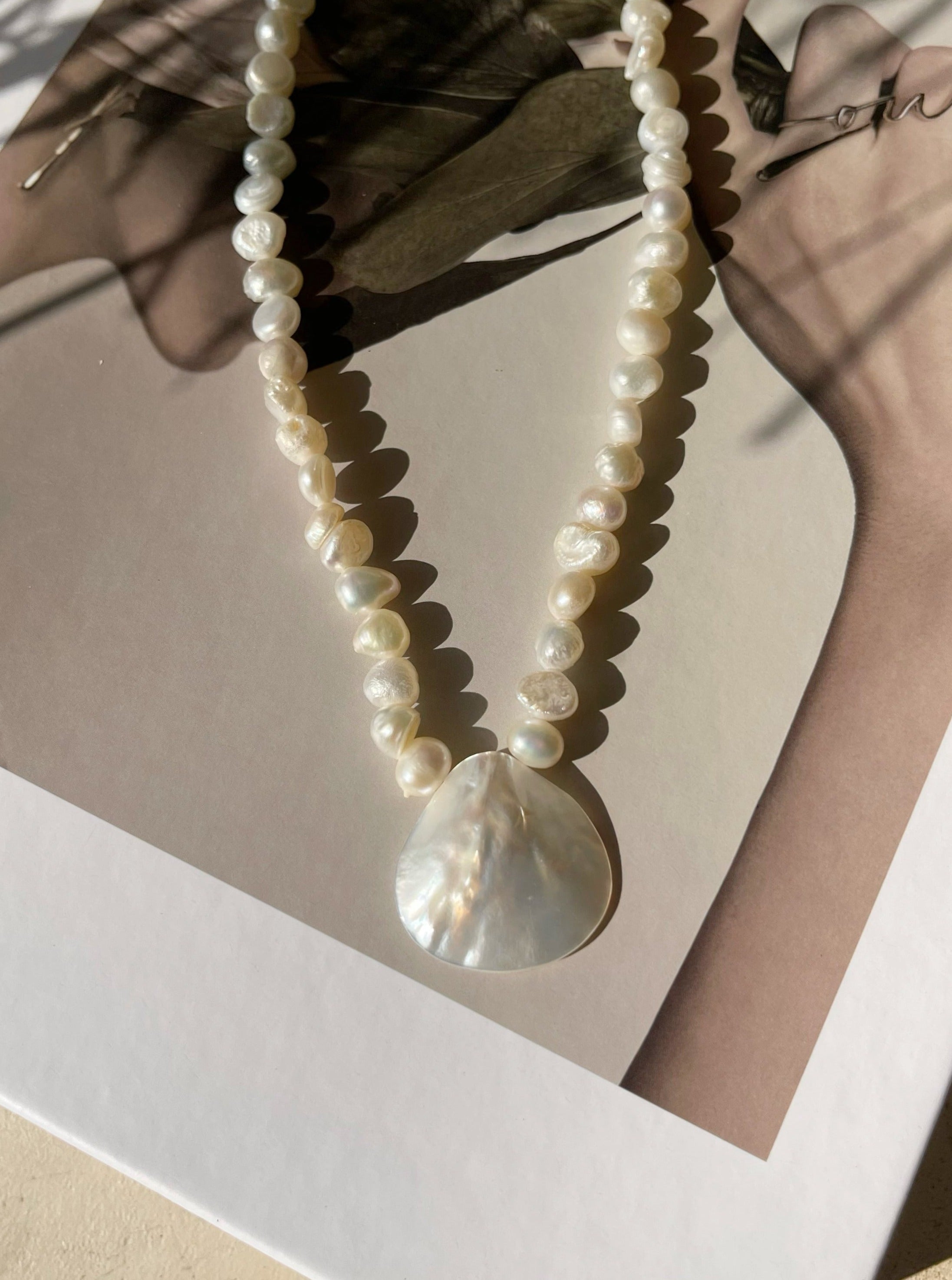 Mermaid Pearl Choker Necklace - Ideal for bohemian fashion lovers, suitable for beach vacations, beach weddings, or daily fashion. Offers minimalistic, boho, and beach-inspired style.