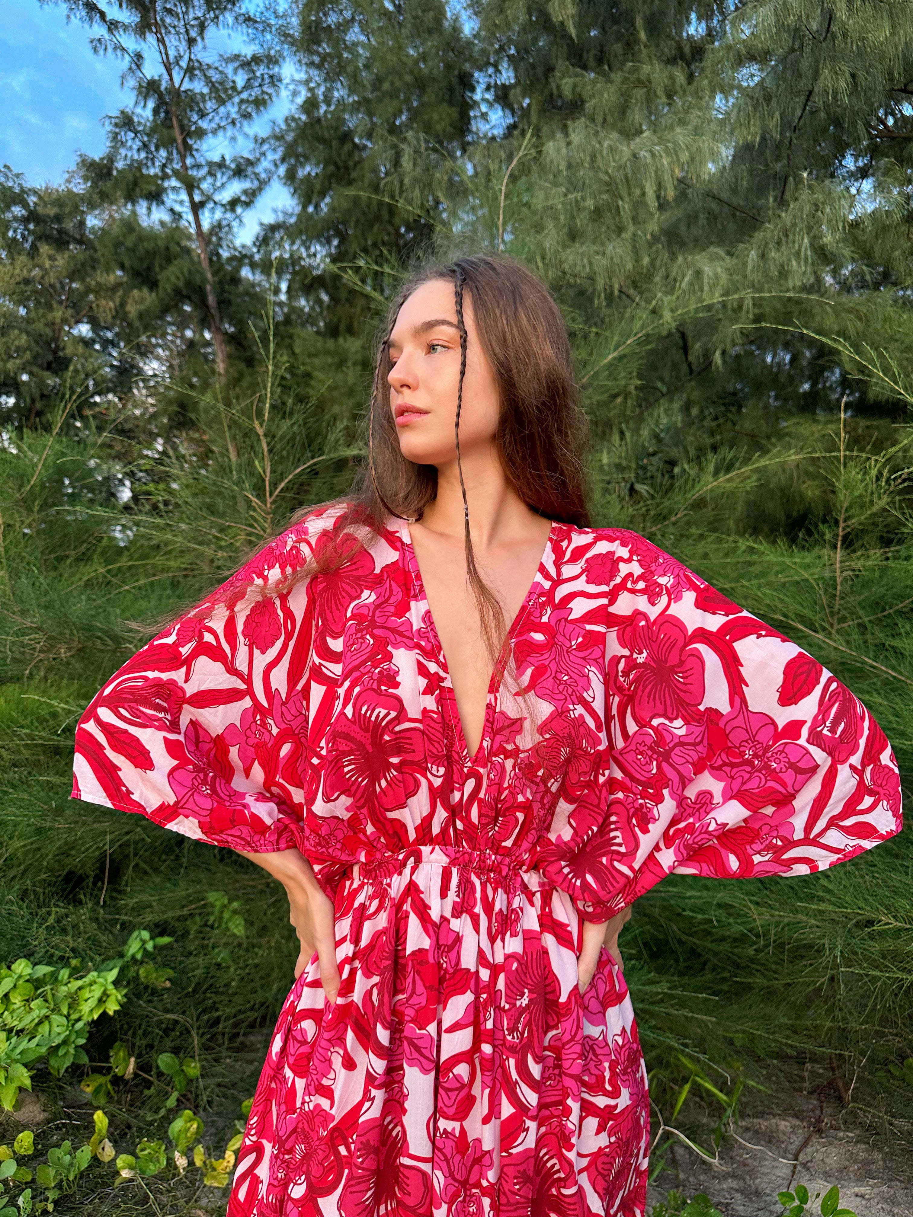 Discover the Kaftan in Pink Floral print—a striking fusion of vibrant color and meticulous design. Embrace the thrill of your upcoming escape with this chic and comfortable caftan, perfect for resort dress, cruise wear, party attire, and everyday elegance. Brought to you by Coco de Chom, this caftan is a stylish companion for various occasions.