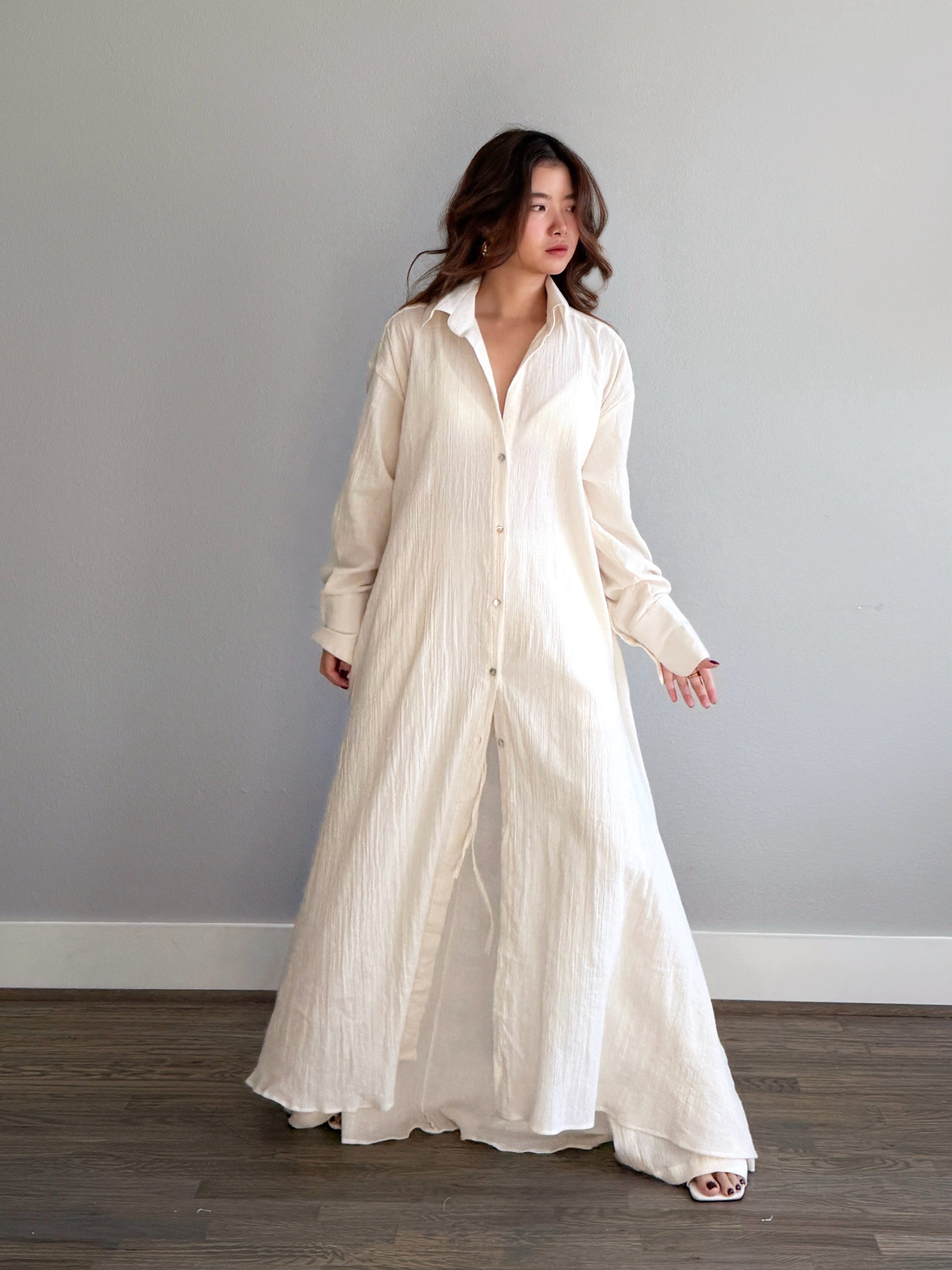 Model wearing organic cotton shirt dress, lightweight button down maxi with relaxed fit for summer and resort