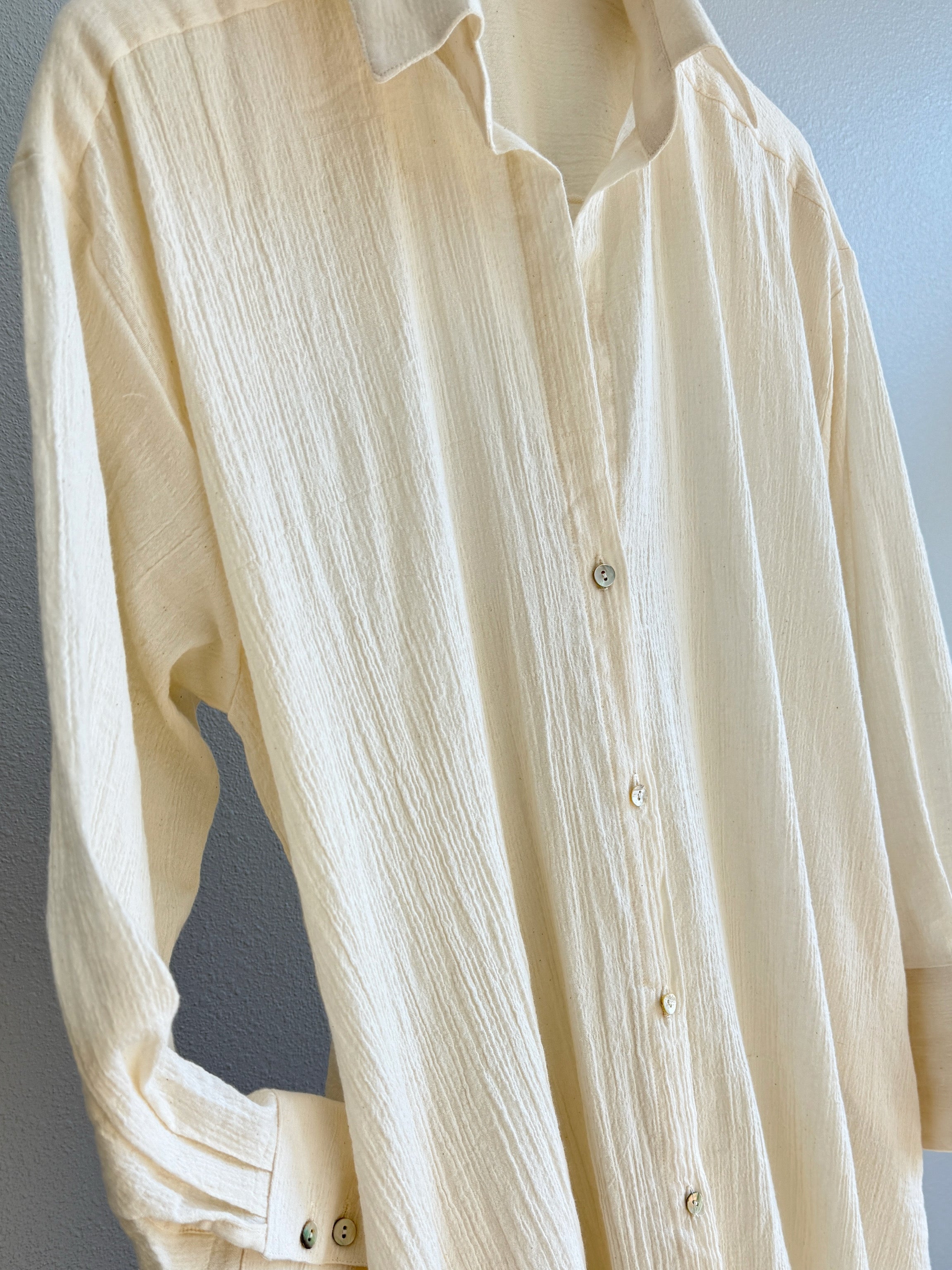 Flowy organic cotton maxi shirt dress styled as beach cover up, minimalist boho resort wear