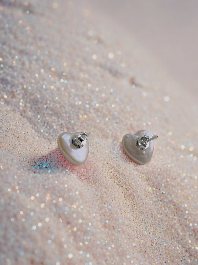 Heart Pearl Stud Earrings - Minimalist style is the perfect choice for beach vacation or every day wear. These pearl earrings are made using natural water fresh pearl  understated elegance. 