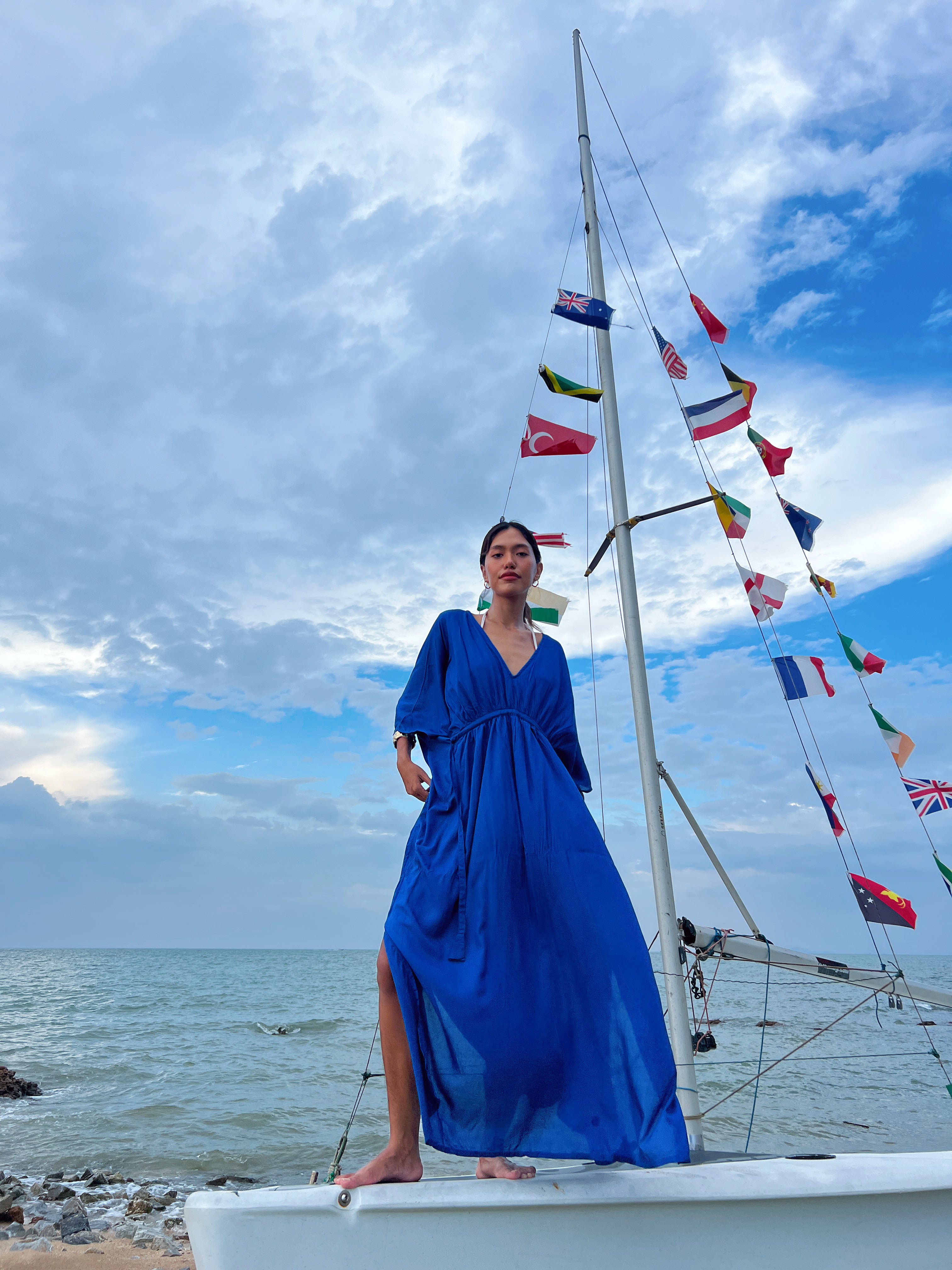 Shop our Andaman Kaftan in Blue - Embrace the anticipation of your upcoming escape with this sophisticated and comfortable oversized caftan. A vacation essential, this maxi kaftan is hand dyed lightweight modal viscose, inspired by a profound love for nature and travel. Elevate your style by pairing it with drop earrings or bracelets—a flawless expression of beauty and wanderlust., this caftan maxi dress is the perfect vacation wear and everyday wear.