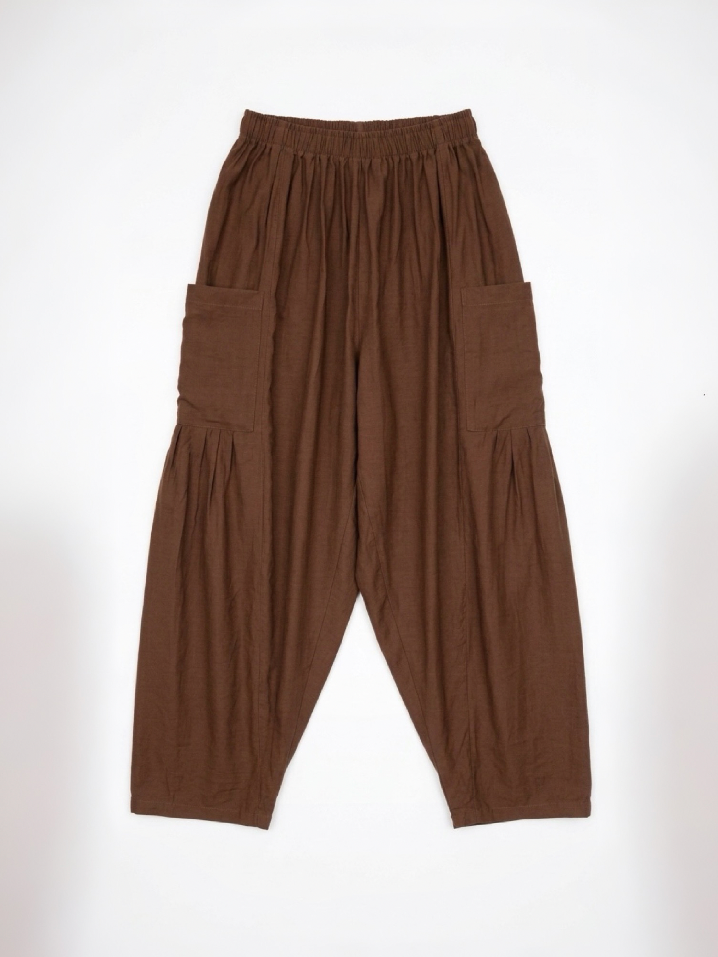 Flat lay of cocoa brown viscose pants with elastic waist and pockets