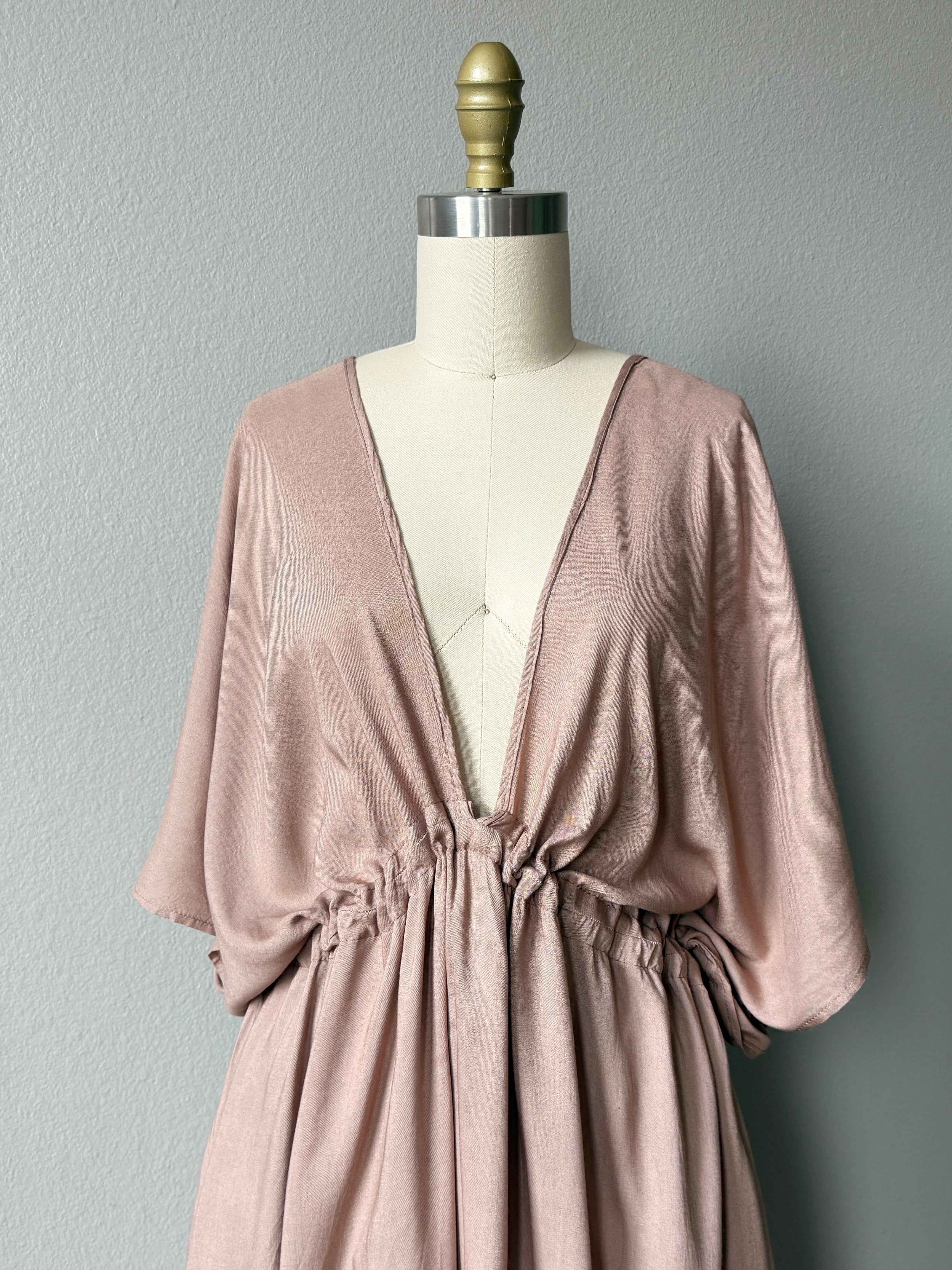 Taupe Long kaftan dress worn by the resort style, oversized beach cover up and plus size friendly resort maxi dress with deep V neckline, side slit, and flowy silhouette