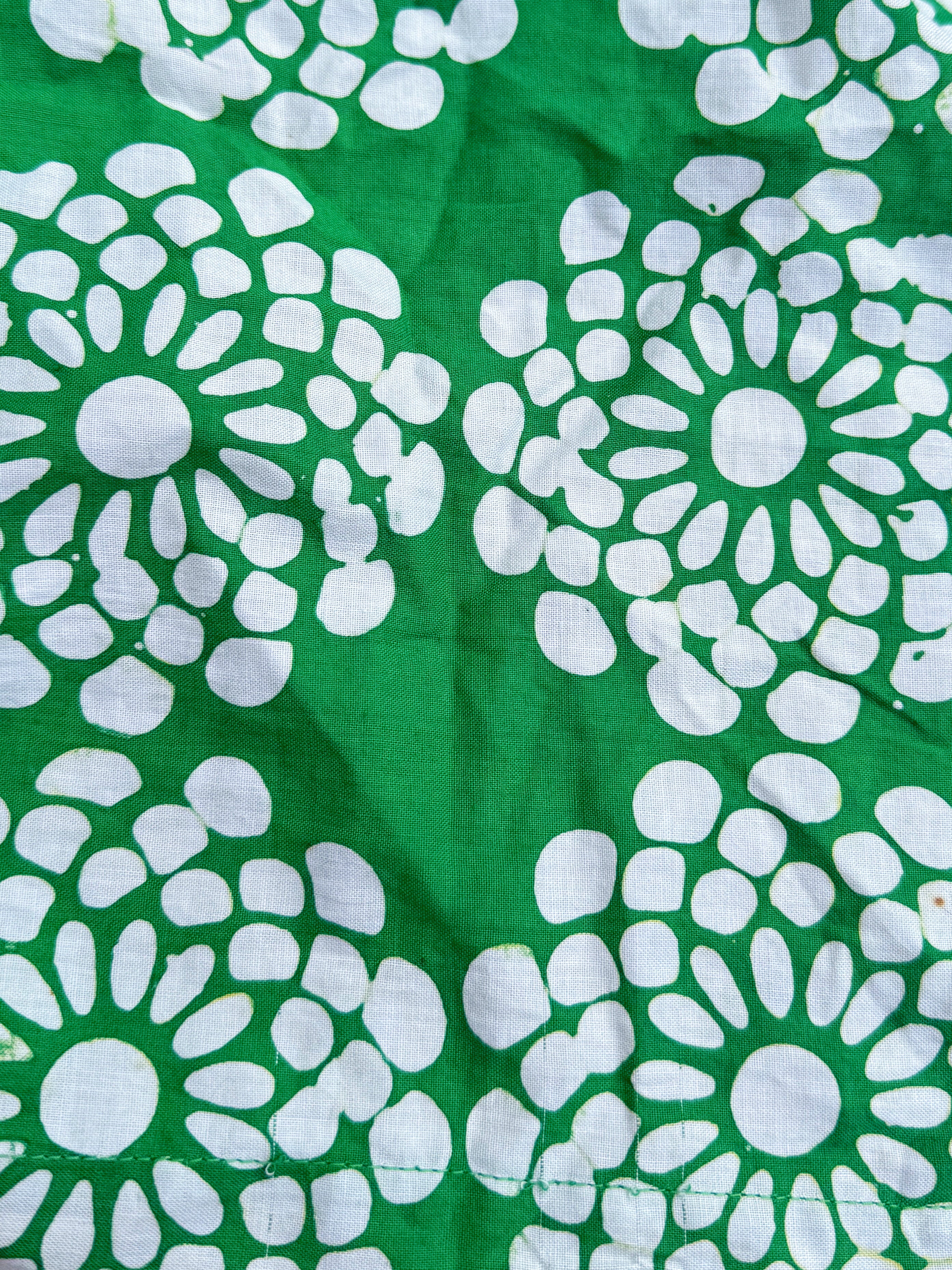 Close-up of tropical flower print – hand block batik cotton top.
