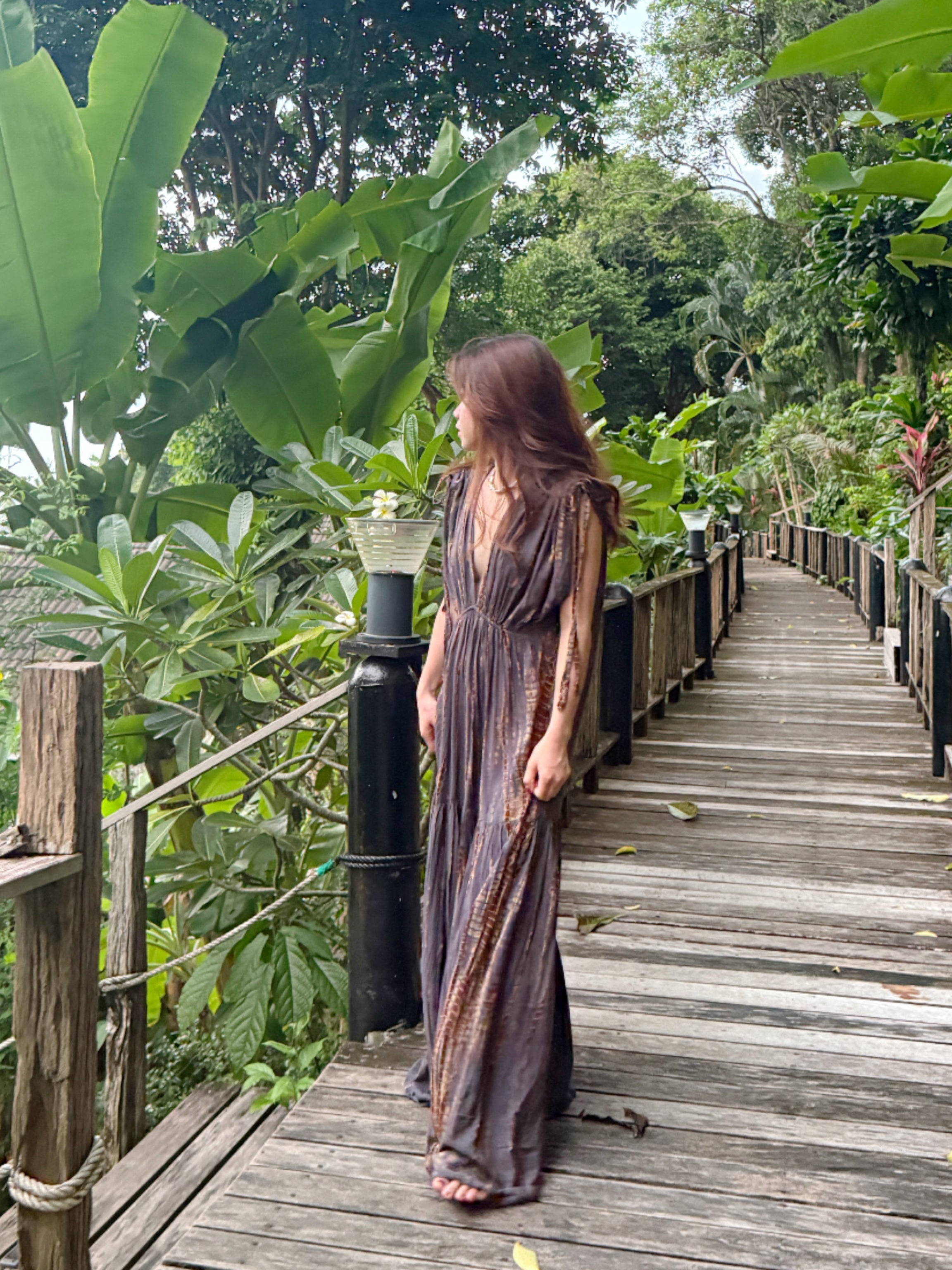 Model wearing the handmade Athena Goddess Kaftan Dress, a tie-dye maxi with pockets, flowy silhouette, and deep V-neckline—perfect for summer dress, beach coverup, resort wear or festivals.
