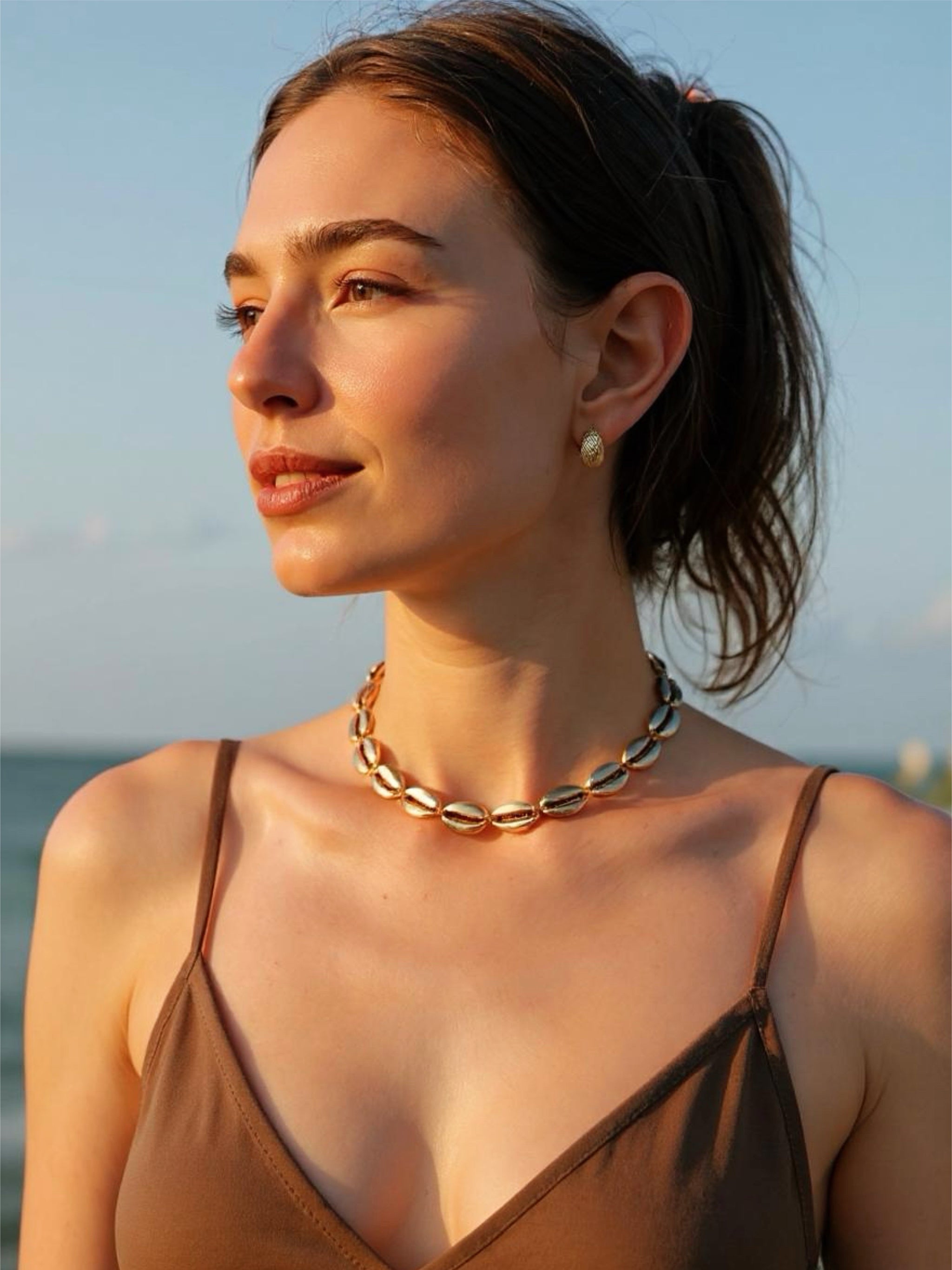 Shop Rosie Gold Cowrie Choker Necklace | Beach Boho Choker Necklace  with Coco de Chom