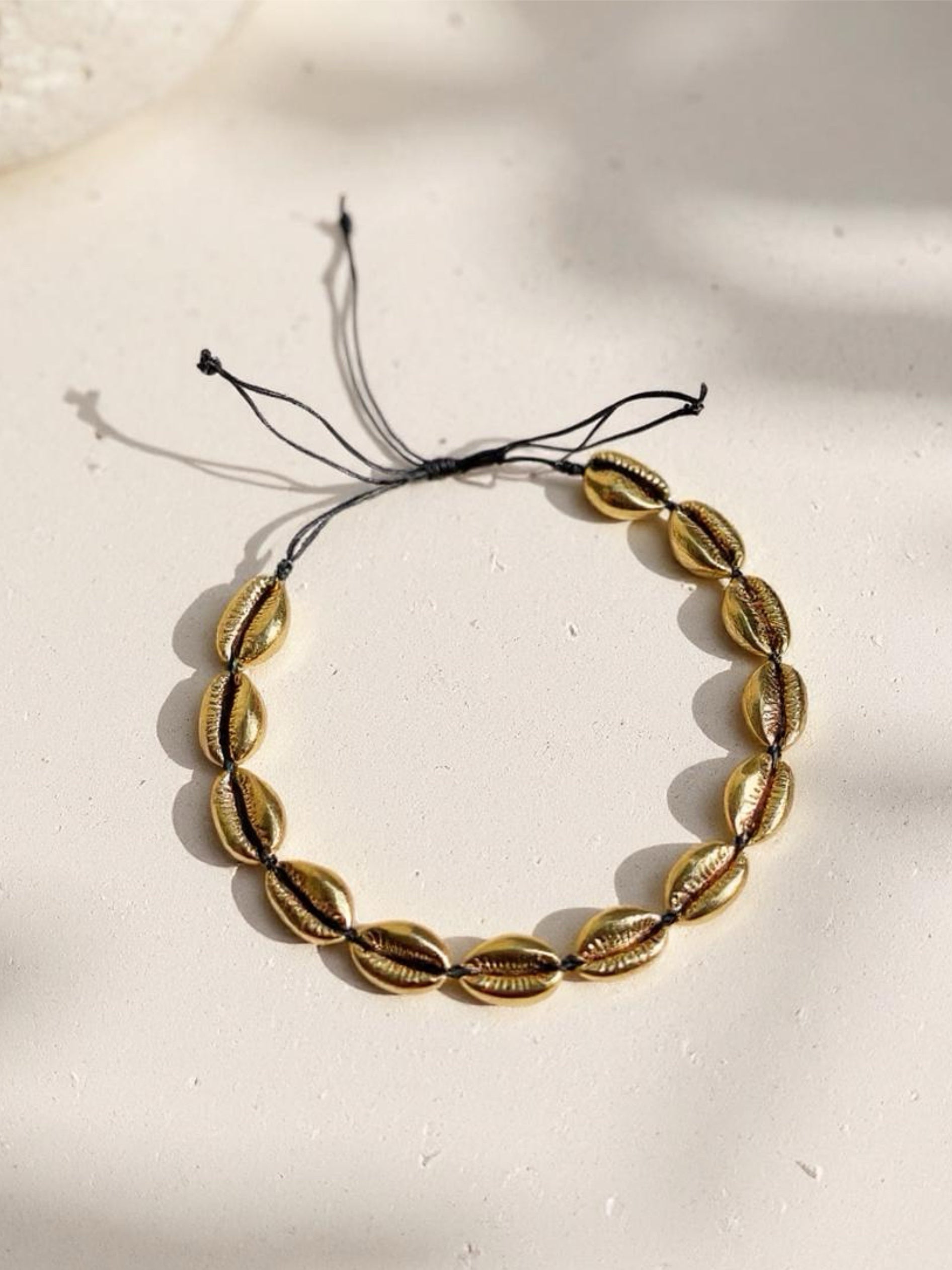 shop Rosie- Gold  Cowrie Seashell Choker Necklace with coco de chom?