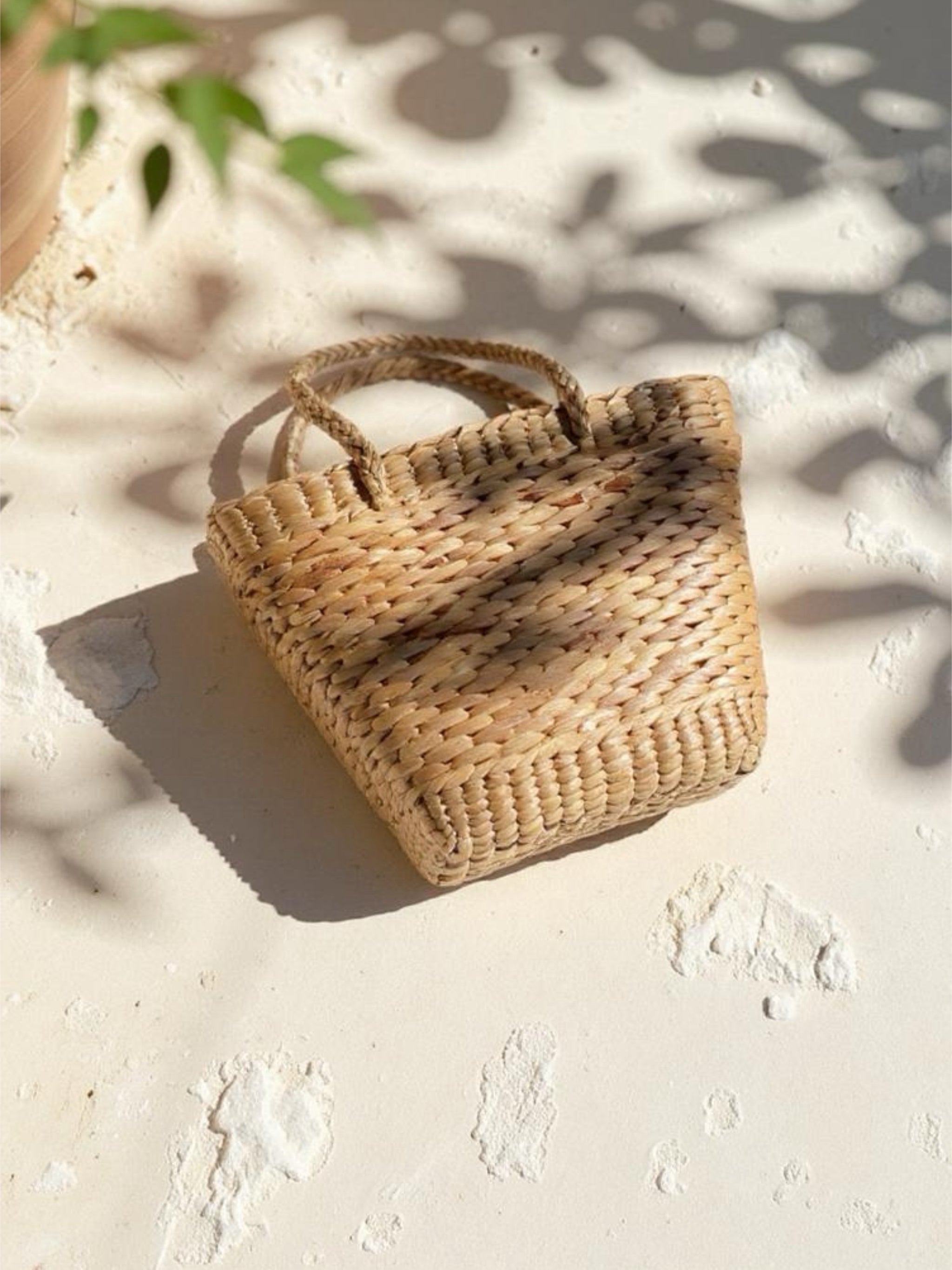 Small rattan picnic bag with braided handles, handmade 