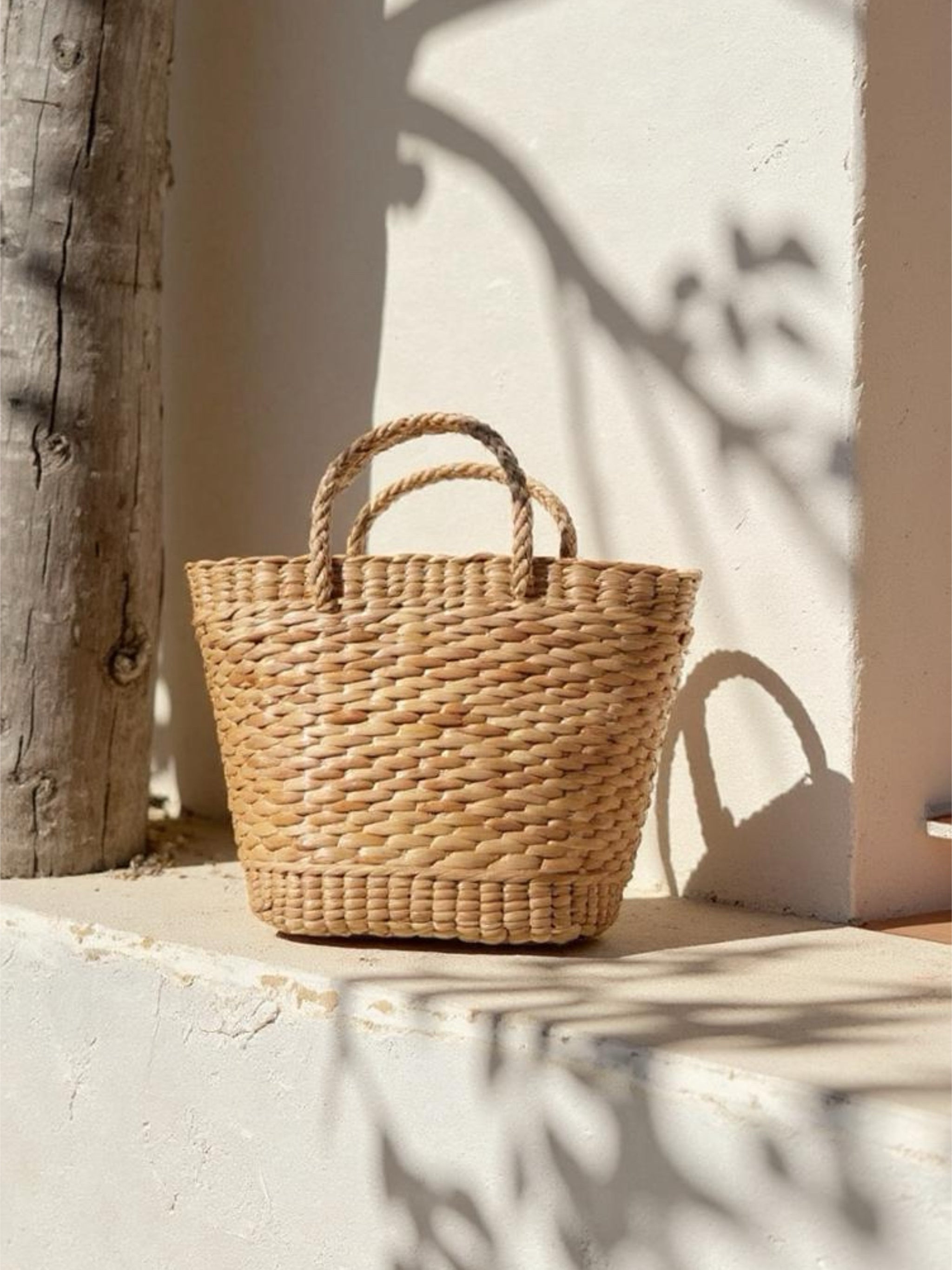 Straw mini bag styled with sundress for vacation look