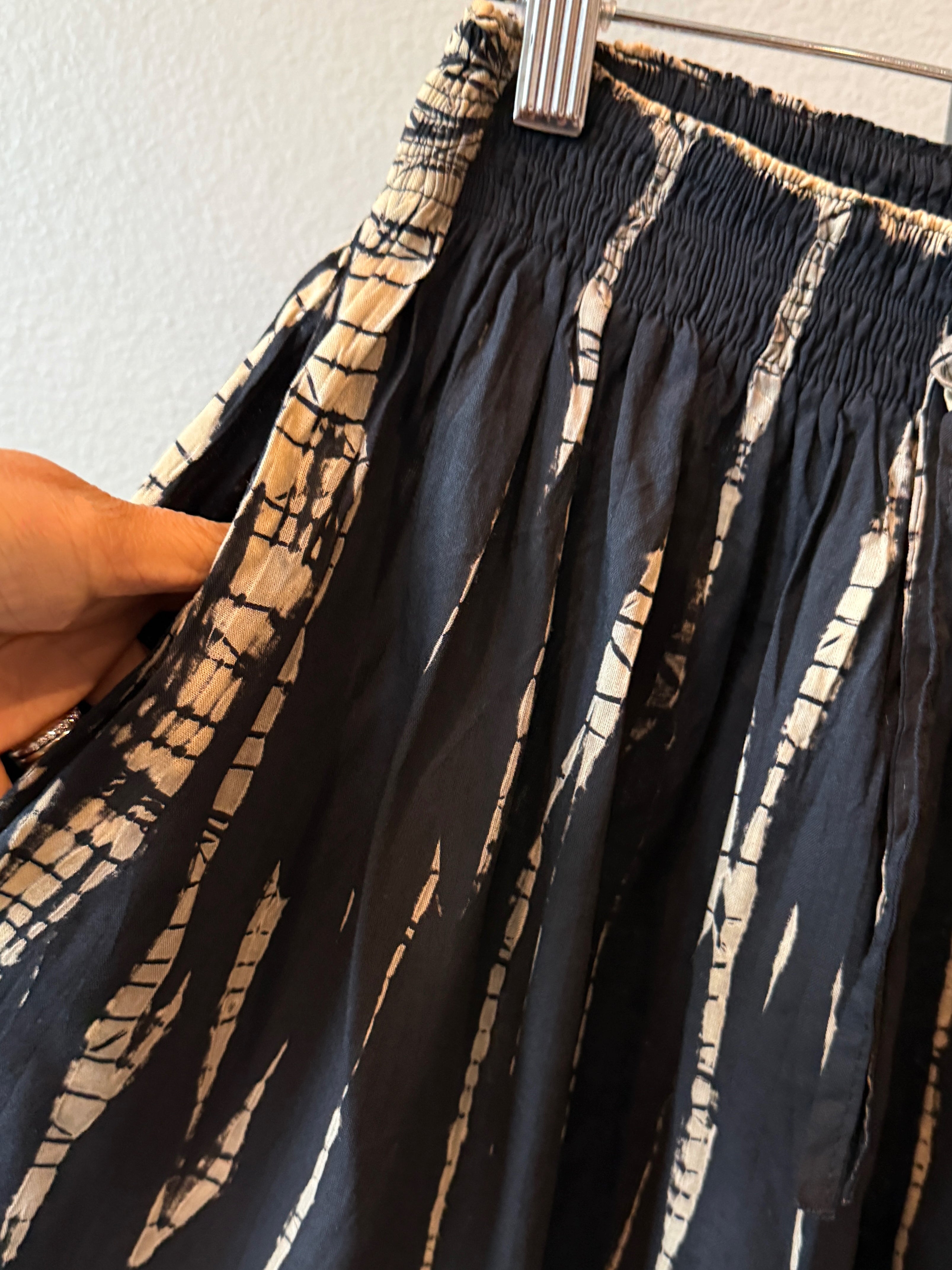 Handmade rayon tie dye shorts with flowy fit and elastic waistband, perfect for casual summer and beach cover up outfits