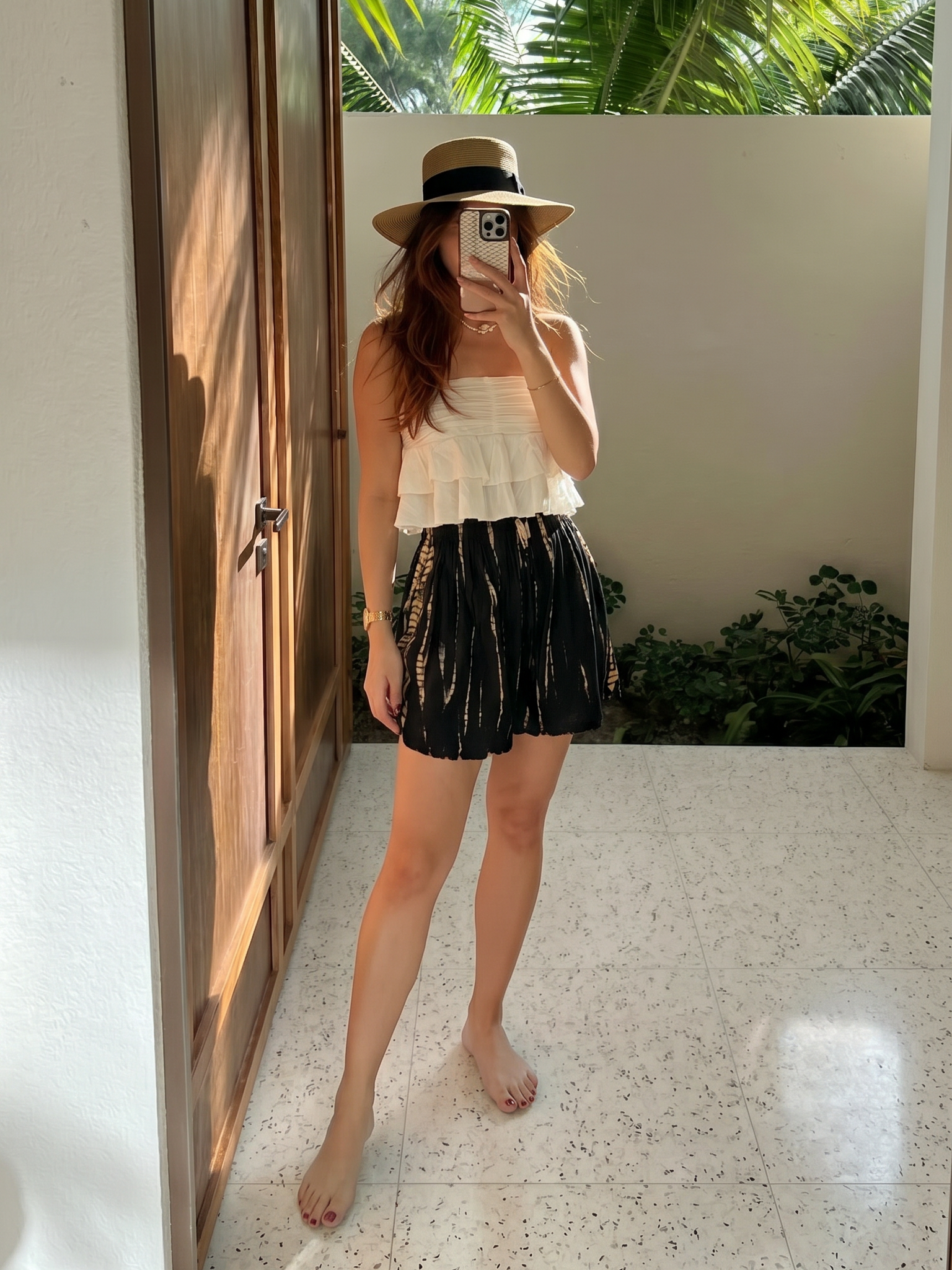 Boho tie dye summer shorts styled for beach days, poolside lounging, resort wear, and warm weather travel