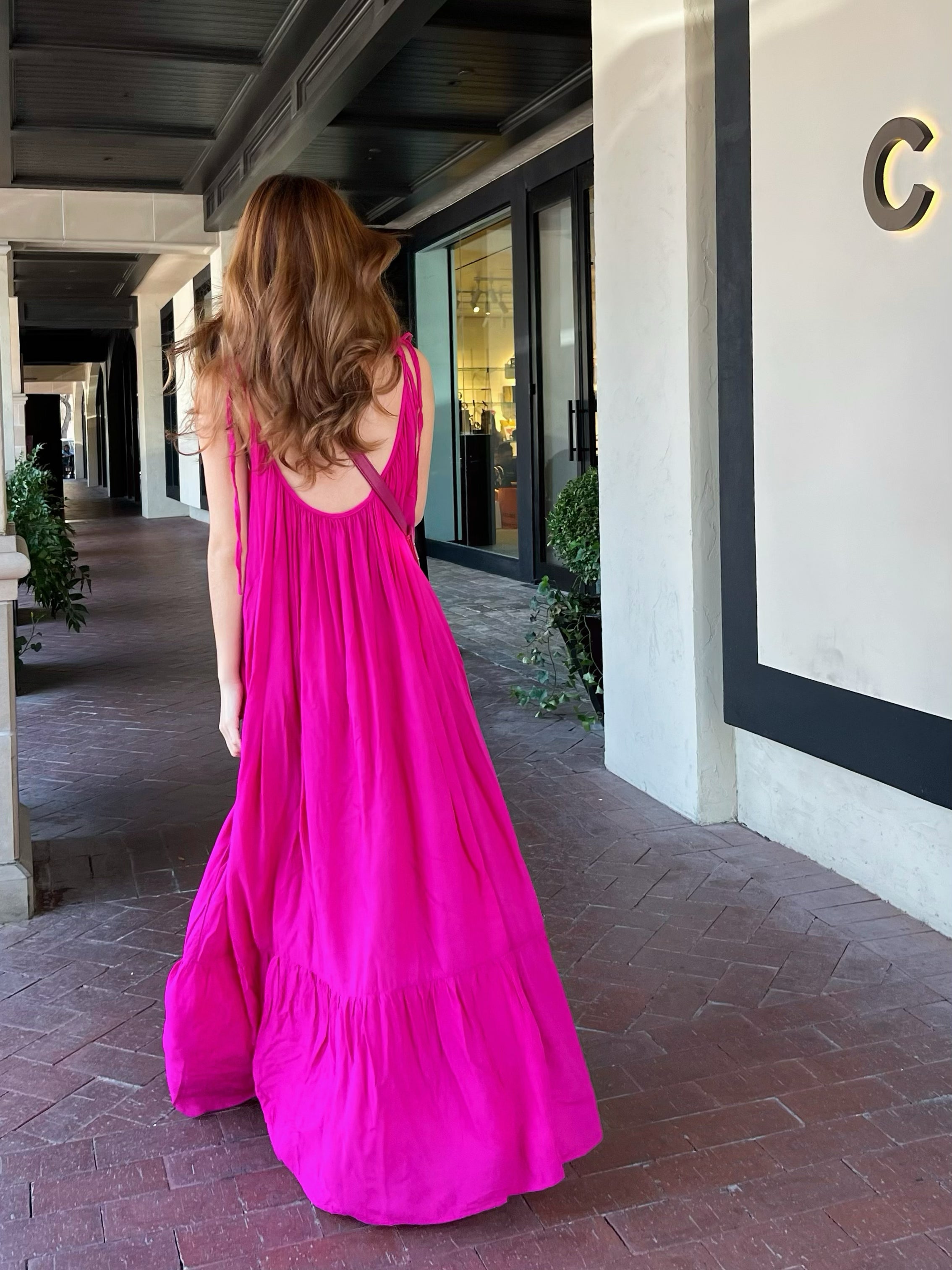 Unleash your inner fashionista with our Hot Pink Backless Maxi Dress from Mali - Shop now and stun the crowd!