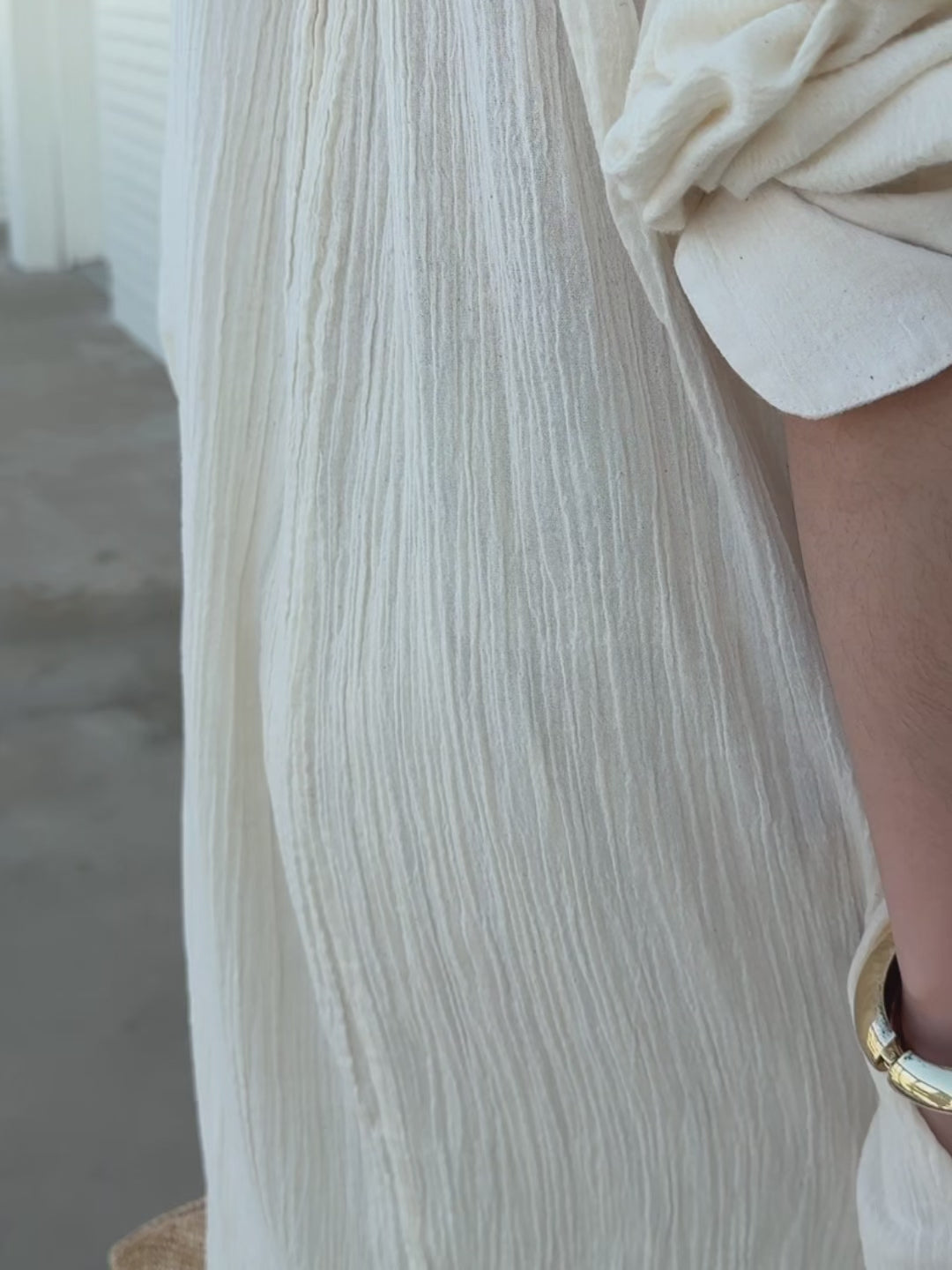 Flowy organic cotton maxi shirt dress styled as beach cover up, minimalist boho resort wear