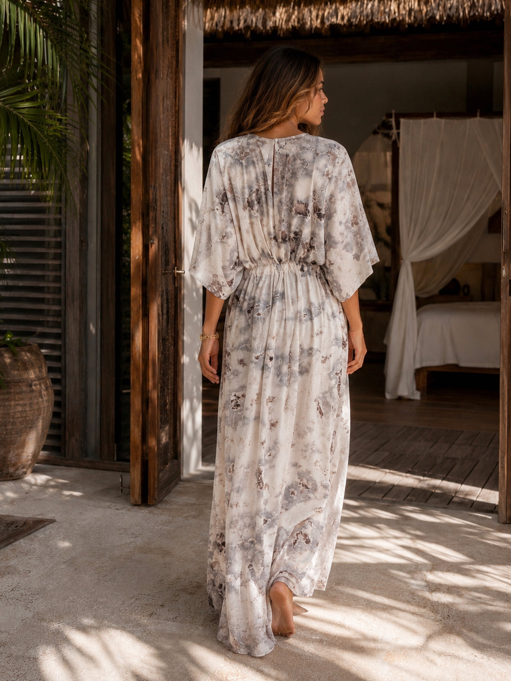 Marble kaftan dress worn at a resort, oversized beach cover up and plus size friendly maxi dress with deep V neckline, side slit, pockets, and flowy silhouette